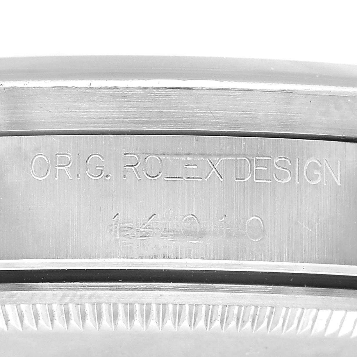 The image shows the side of the Rolex Air-King 14010 Men's Stainless Steel Black Dial case, highlighting the engraved model and design details.