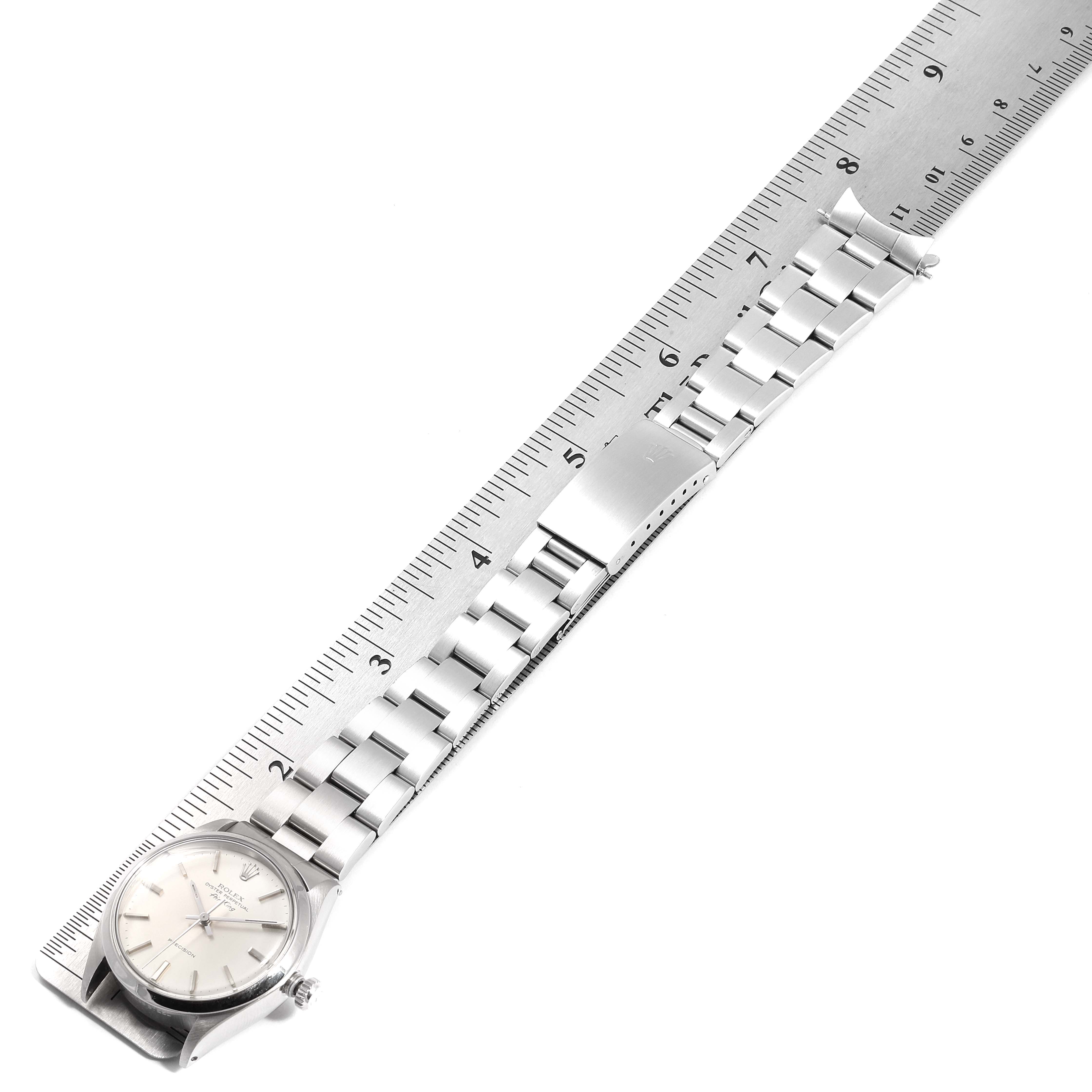 The Rolex Vintage Collection 5500 Men's Stainless Steel Silver Dial 5500 Men's Stainless Steel Silver Dial model watch is displayed flat with a ruler, showing the bracelet, clasp, and watch face.