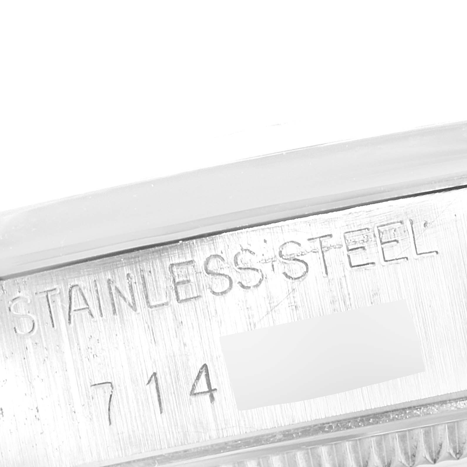 This close-up image shows the stainless steel marking and part of the serial number on the side of a Rolex Vintage Collection 5500 Men's Stainless Steel Silver Dial 5500 Men's Stainless Steel Silver Dial watch case.