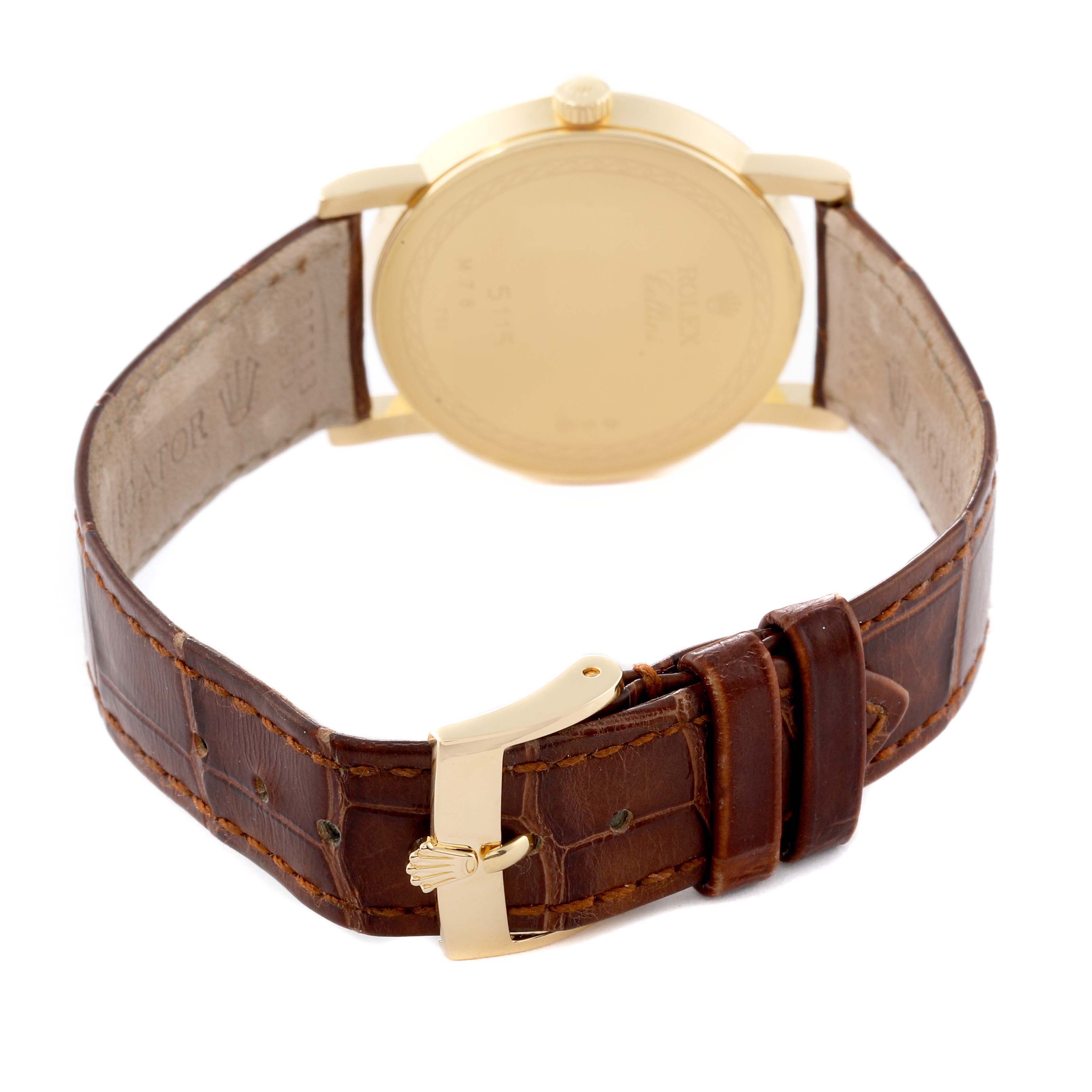 The image shows the back view of a Rolex Cellini 5115 Men's Yellow Gold Silver Dial 5115 Men's Yellow Gold Silver Dial watch, highlighting the case back and leather strap with a gold buckle.