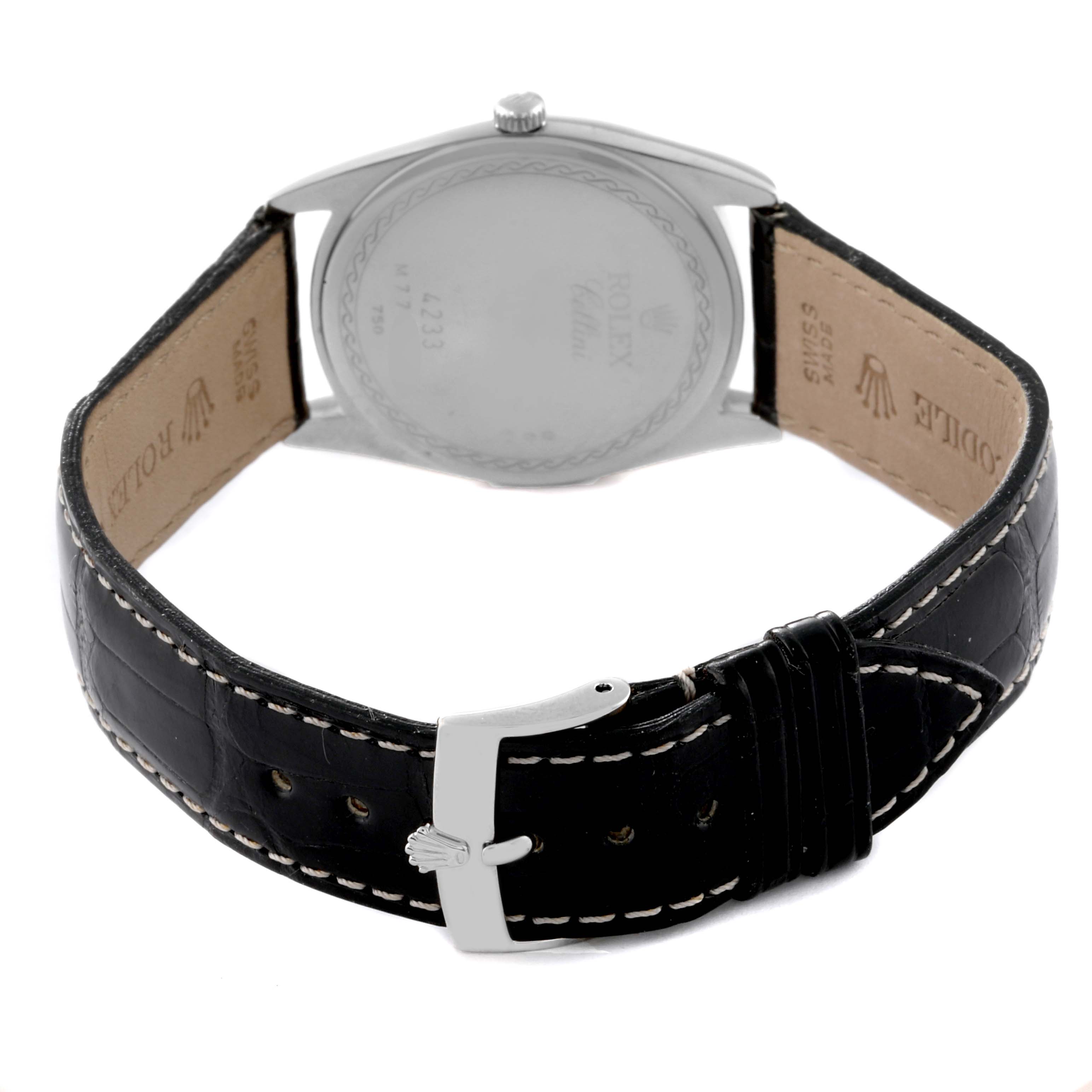 The image shows the back view of a Rolex Cellini 4233 Men's Steel and Gold (two tone) Black Dial 4233 Men's Steel and Gold (two tone) Black Dial watch, highlighting its leather strap and clasp.