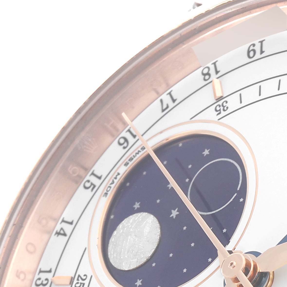 This image shows the dial of the Rolex Cellini 50535 Men's Rose Gold White Dial 50535 Men's Rose Gold White Dial model, highlighting the moonphase complication and the date indicator.