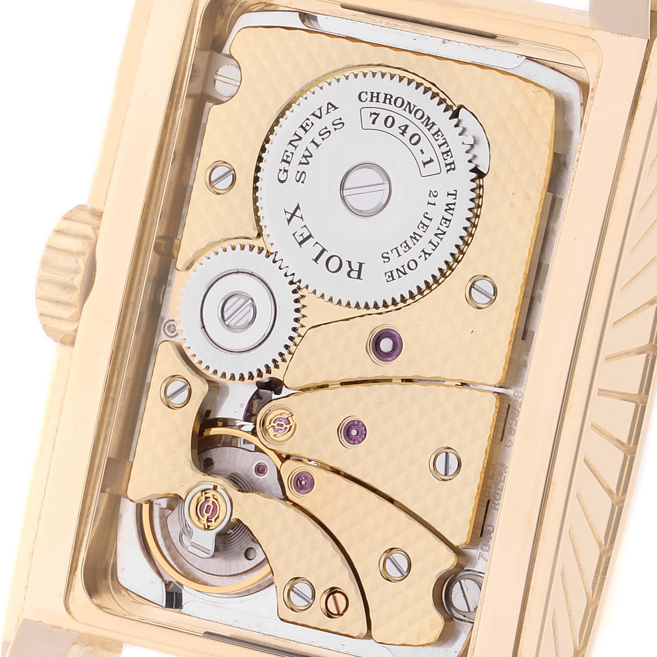 This image shows the intricate inner mechanism of the Rolex Cellini 5440/8 Men's Yellow Gold Champagne Dial 5440/8 Men's Yellow Gold Champagne Dial watch, focusing on the movement and gears.