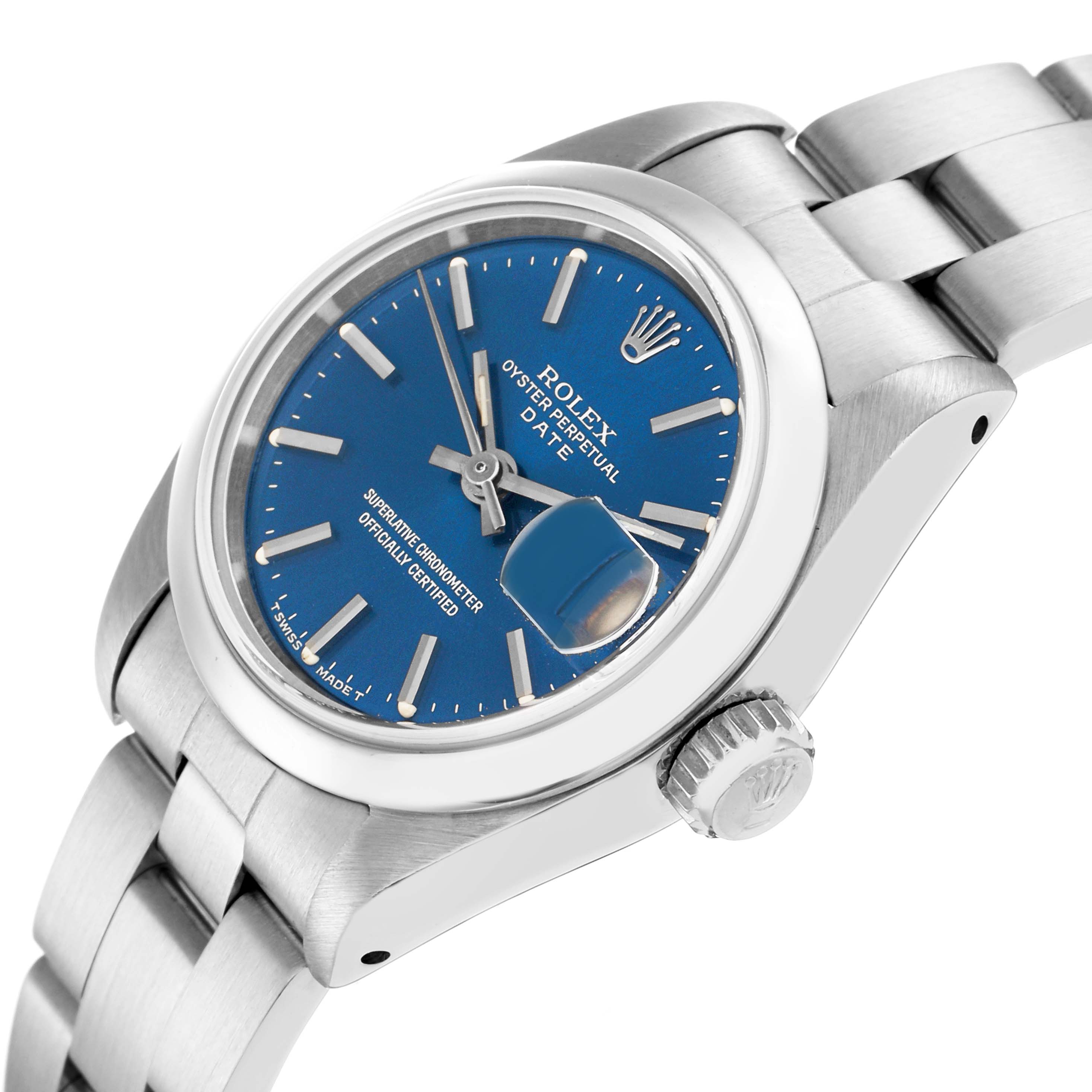 The Rolex Date 69160 Women
s Stainless Steel Blue Dial model watch is shown at a three-quarter angle, displaying the blue dial, bezel, case, crown, and part of the bracelet.