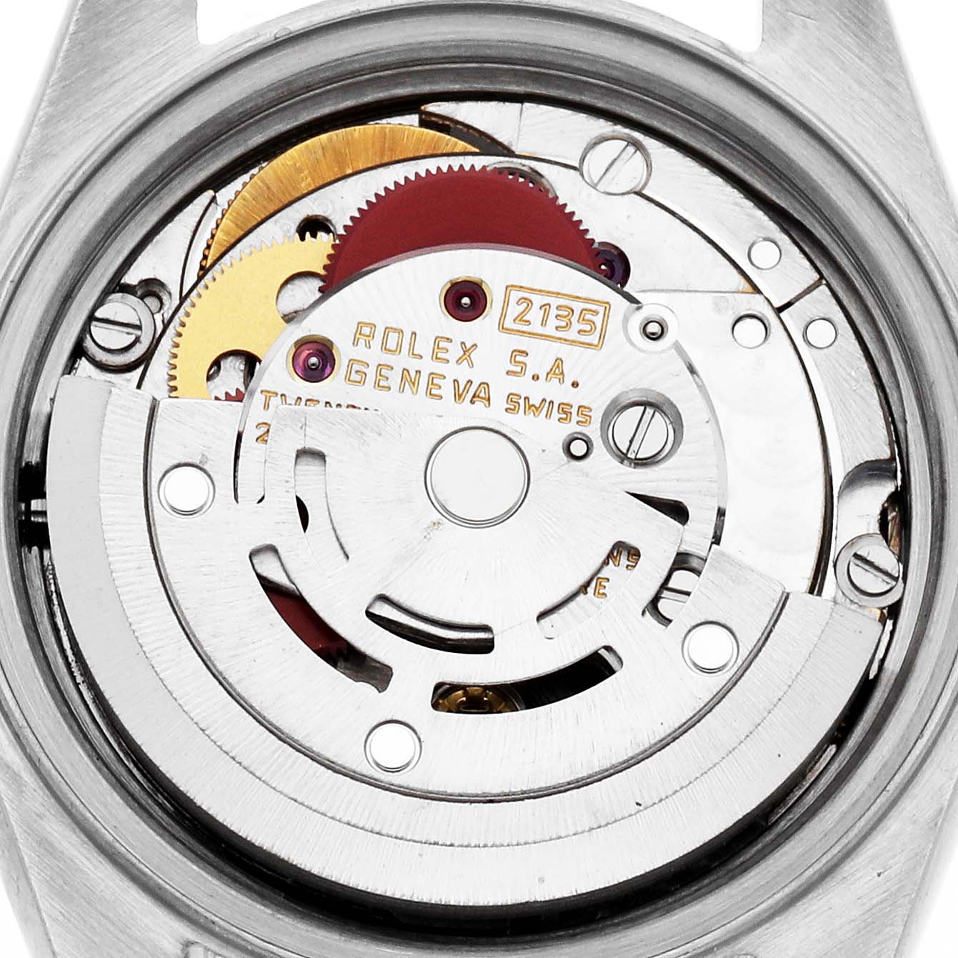 The image shows the movement from the back of a Rolex Date 69160 Women
s Stainless Steel Blue Dial, displaying gears and engravings.