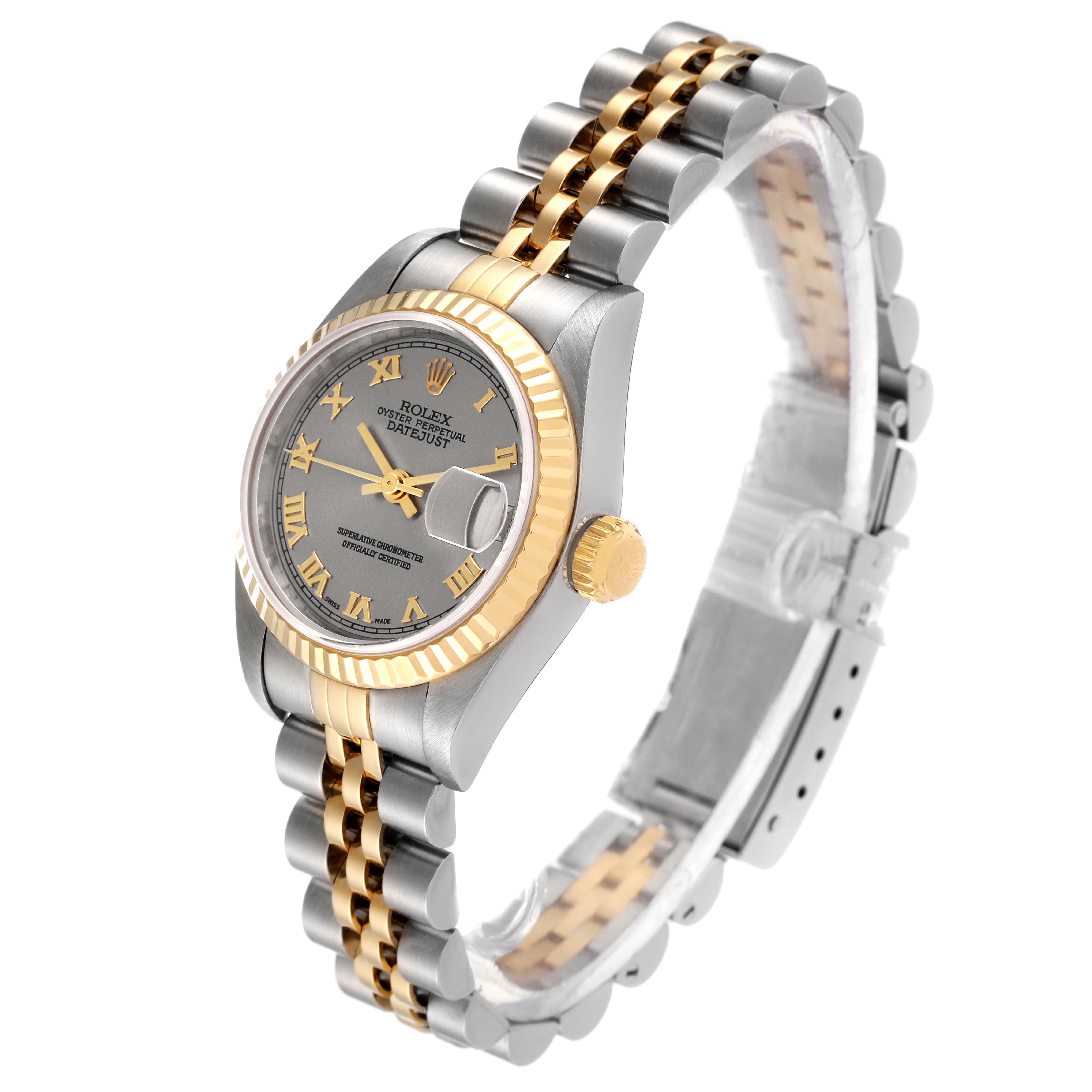 The Rolex Datejust 79173 Women
s Steel and Gold (two tone) Grey Dial 79173 Women
s Steel and Gold (two tone) Grey Dial watch is shown at an angle, featuring its bracelet, bezel, dial, and crown.