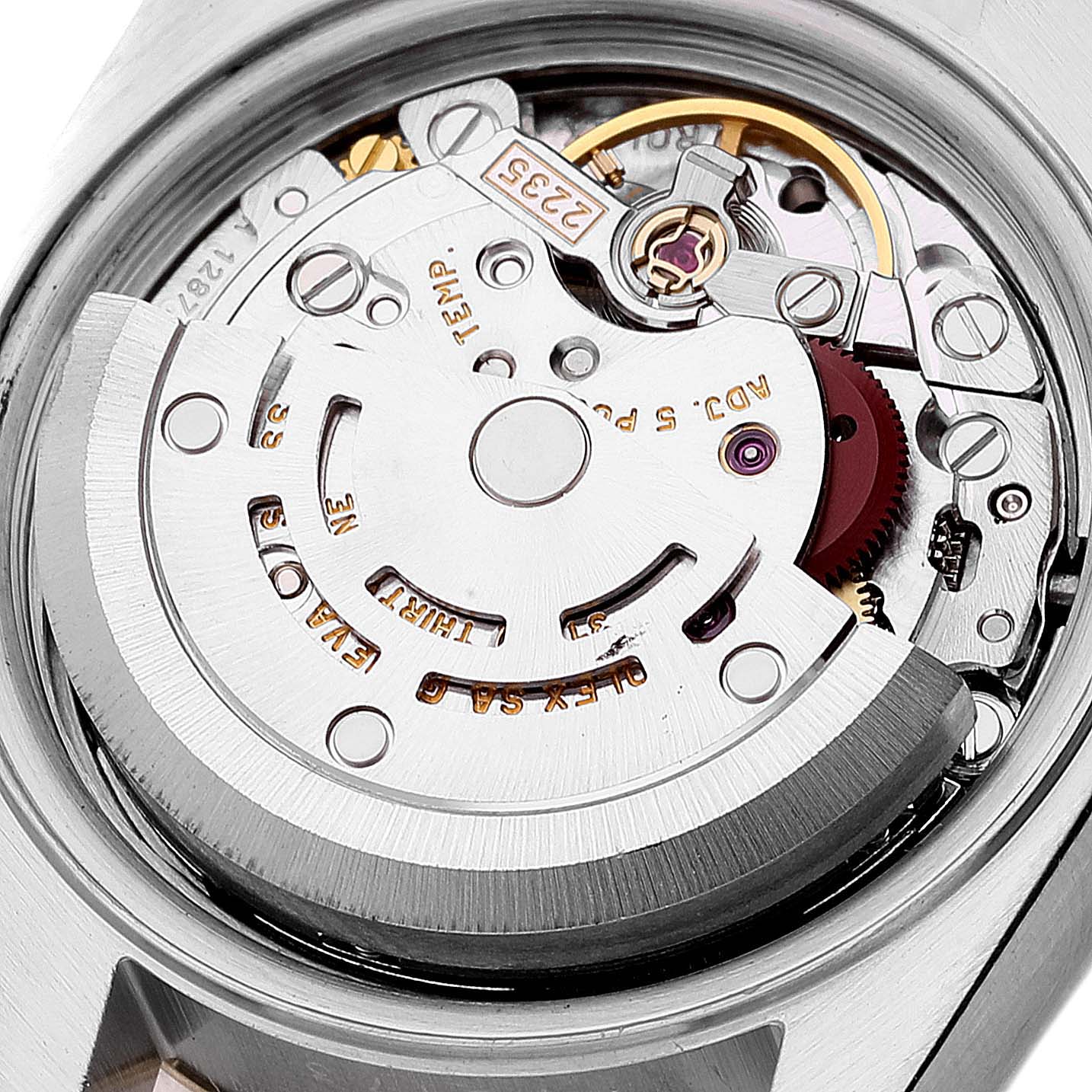 This is a close-up view of the movement and internal mechanism of a Rolex Datejust 79173 Women
s Steel and Gold (two tone) Grey Dial 79173 Women
s Steel and Gold (two tone) Grey Dial watch.