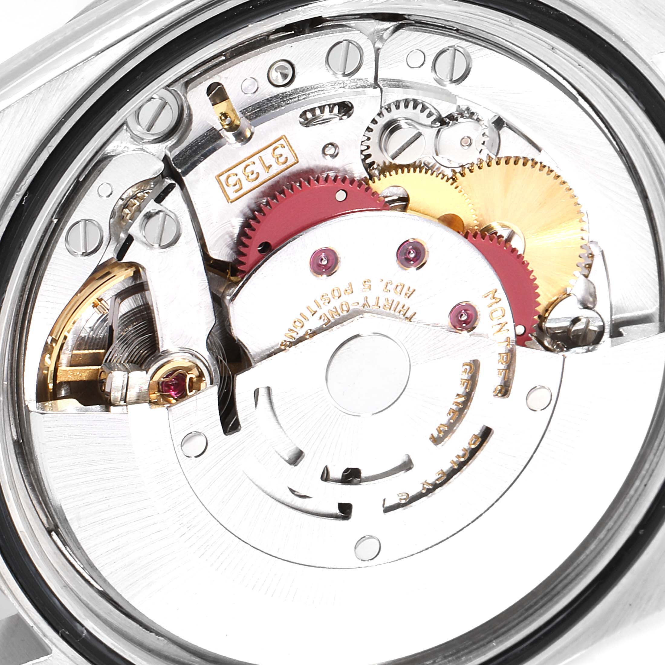 The image shows the internal mechanism of the Rolex Datejust 16234 Men's Stainless Steel Black Dial 16234 Men's Stainless Steel Black Dial watch, focusing on the gears and movement components.