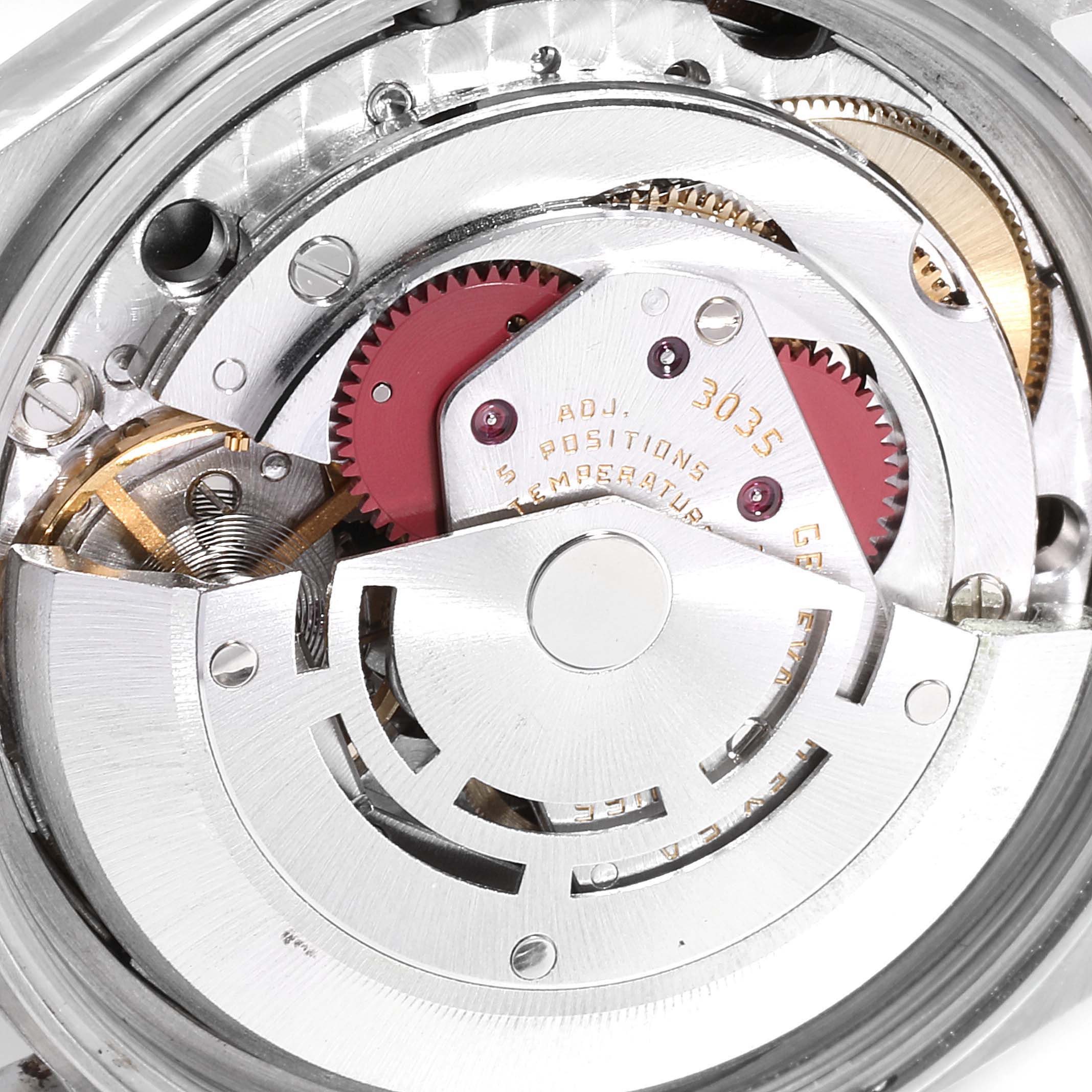 The image shows a close-up view of the internal mechanism of a Rolex Vintage Collection 16013 Men's Steel and Gold (two tone) Champagne Dial 16013 Men's Steel and Gold (two tone) Champagne Dial watch model, focusing on the movement and gears.