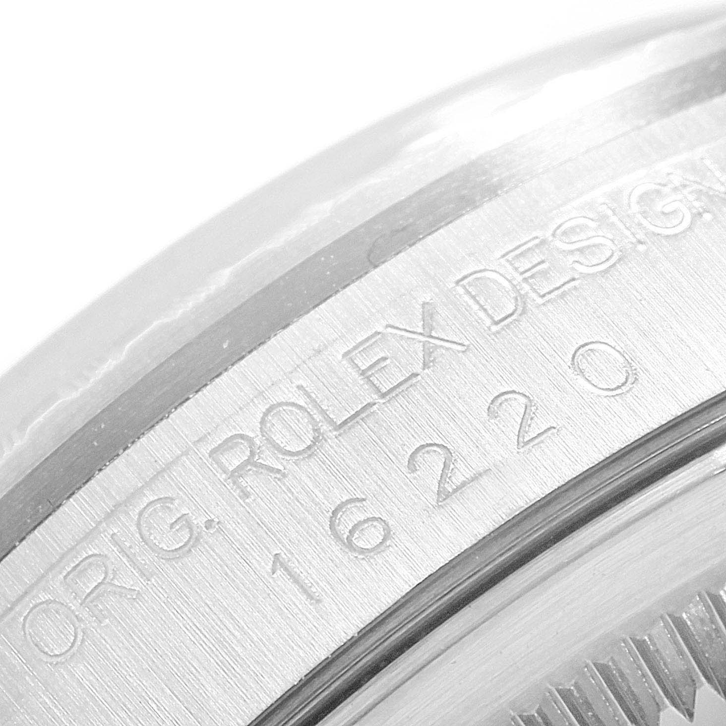 This image shows a close-up of the case side engraving on a Rolex Datejust 16220 Men
s Stainless Steel Black Dial 16220 Men
s Stainless Steel Black Dial watch, displaying the model number.