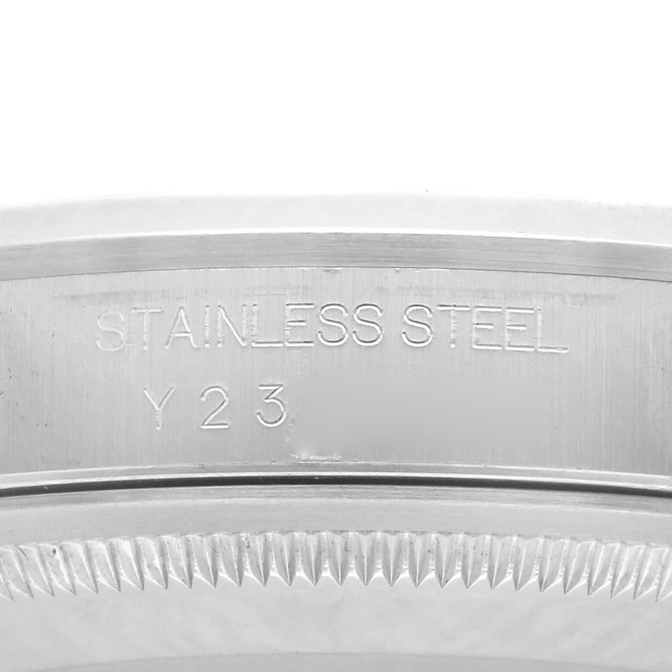The image shows a close-up of the case back of a Rolex Datejust 16200 Men's Stainless Steel Black Dial 16200 Men's Stainless Steel Black Dial watch, displaying "STAINLESS STEEL Y23" engraving.