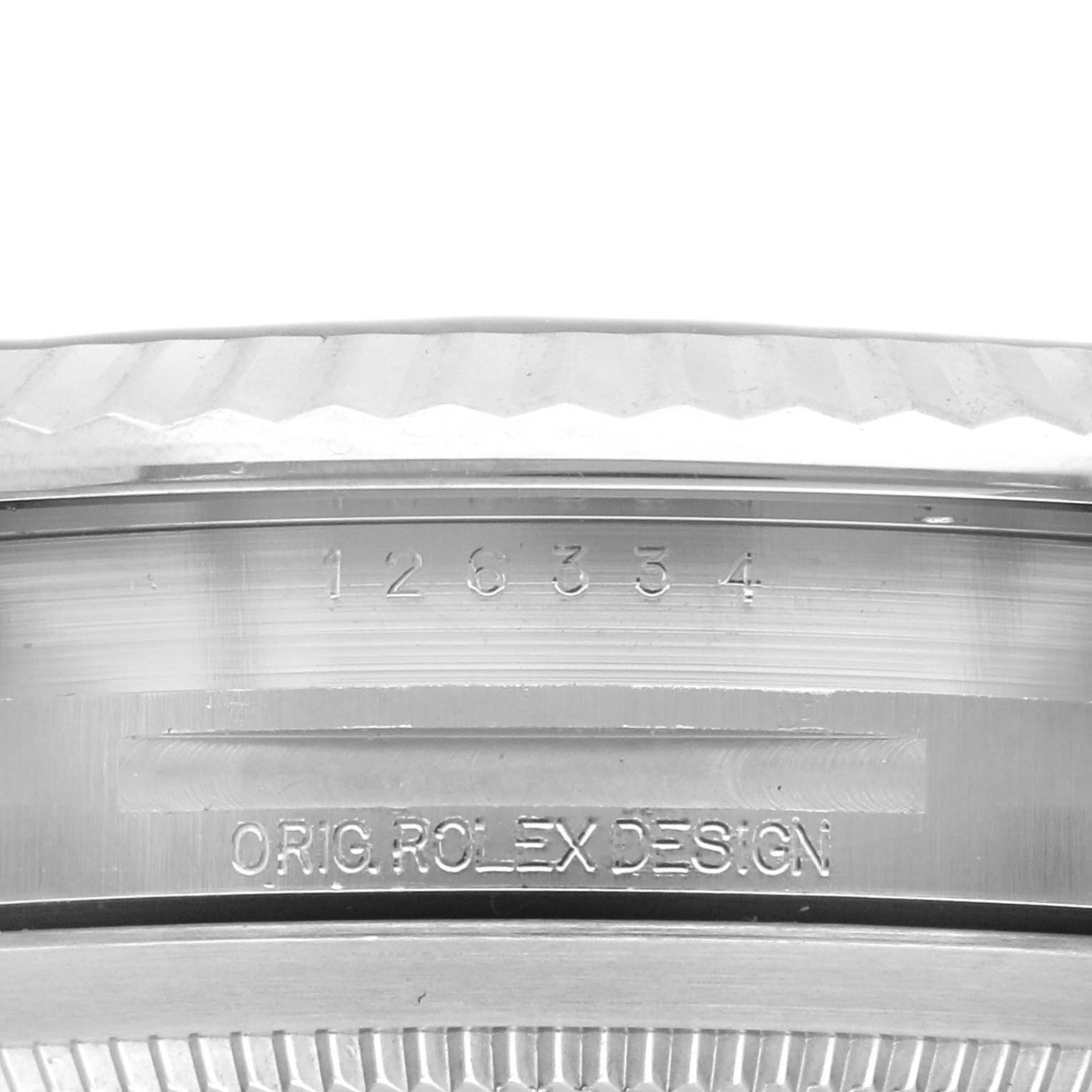 This image shows a close-up of the case where "126334" and "ORIG ROLEX DESIGN" are engraved on the Rolex Datejust 41 126334 Men
s Stainless Steel Green Dial 126334 Men
s Stainless Steel Green Dial model.