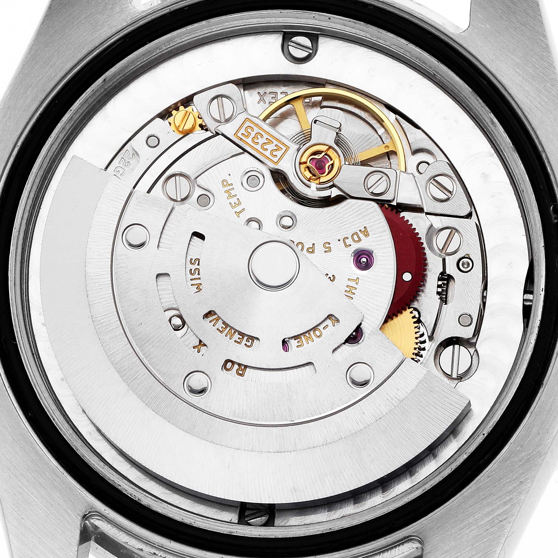 This image shows the internal mechanism of a Mid-Size Rolex watch with a detailed view of the movement components.