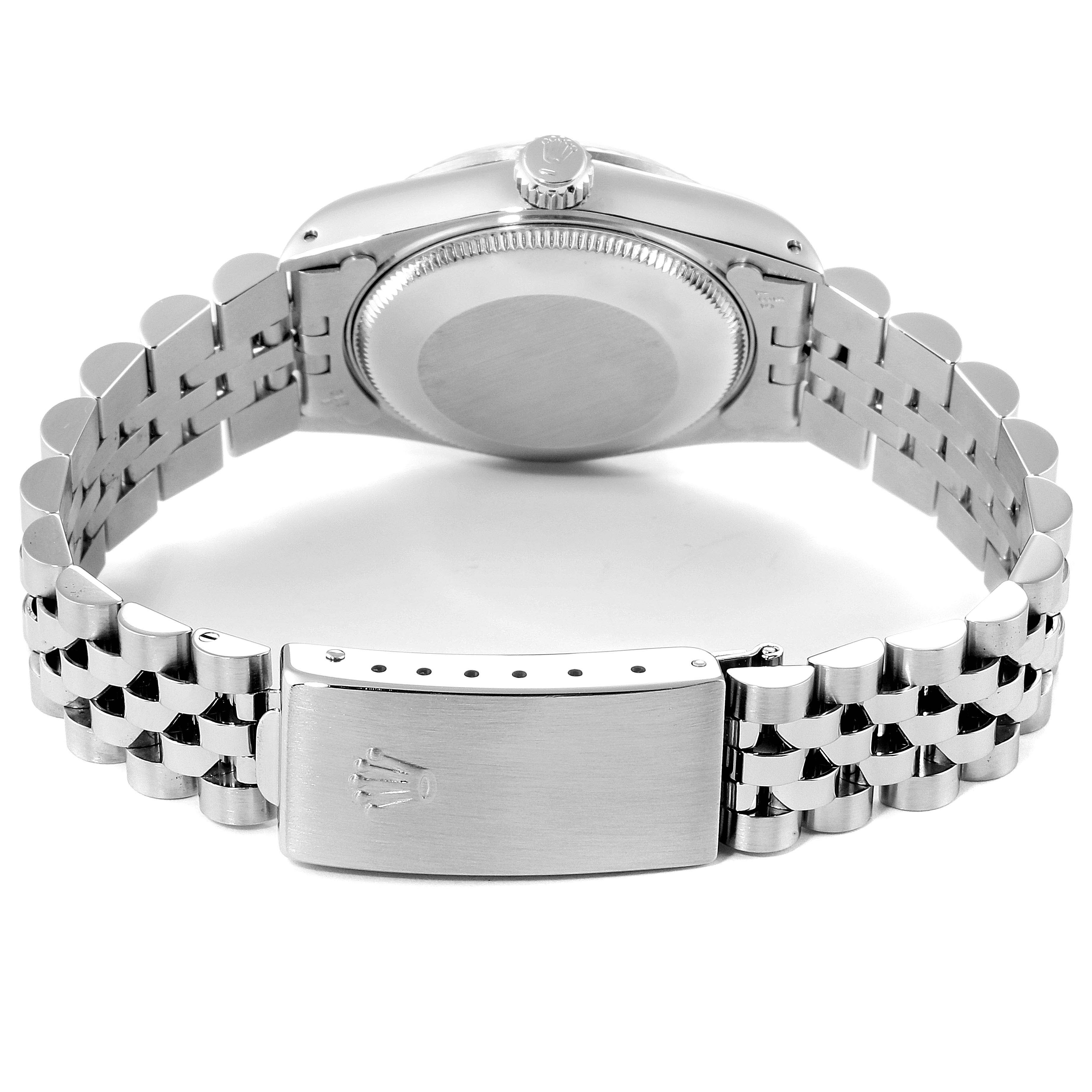 This image shows the back case and bracelet clasp of a Rolex Mid-Size 68274 Women
s Stainless Steel Silver Dial 68274 Women
s Stainless Steel Silver Dial model watch, viewed from the rear.