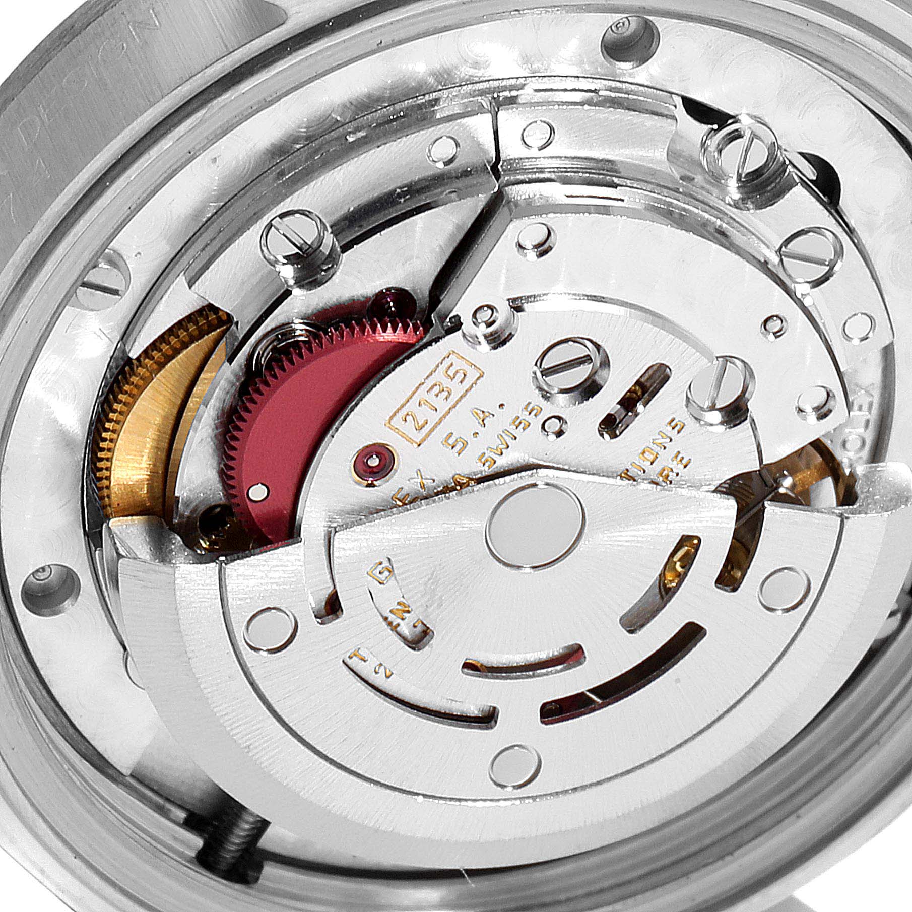 This image shows a close-up of the internal movement components of a Rolex Mid-Size 68274 Women
s Stainless Steel Silver Dial 68274 Women
s Stainless Steel Silver Dial watch.
