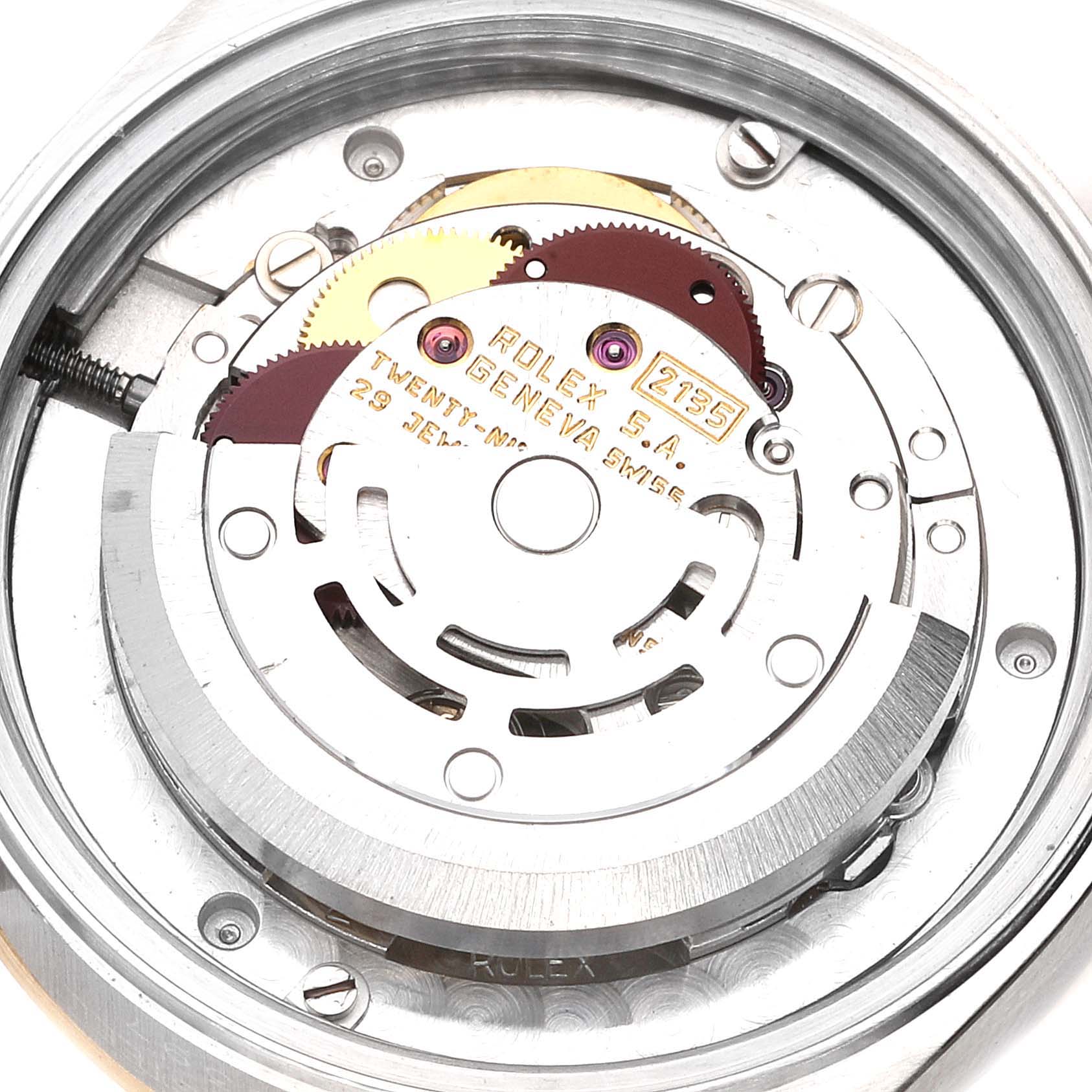 This image shows the inner mechanical movement parts of a Rolex Mid-Size 68273 Women
s Steel and Gold (two tone) Champagne Dial 68273 Women
s Steel and Gold (two tone) Champagne Dial watch, highlighting gears and components.