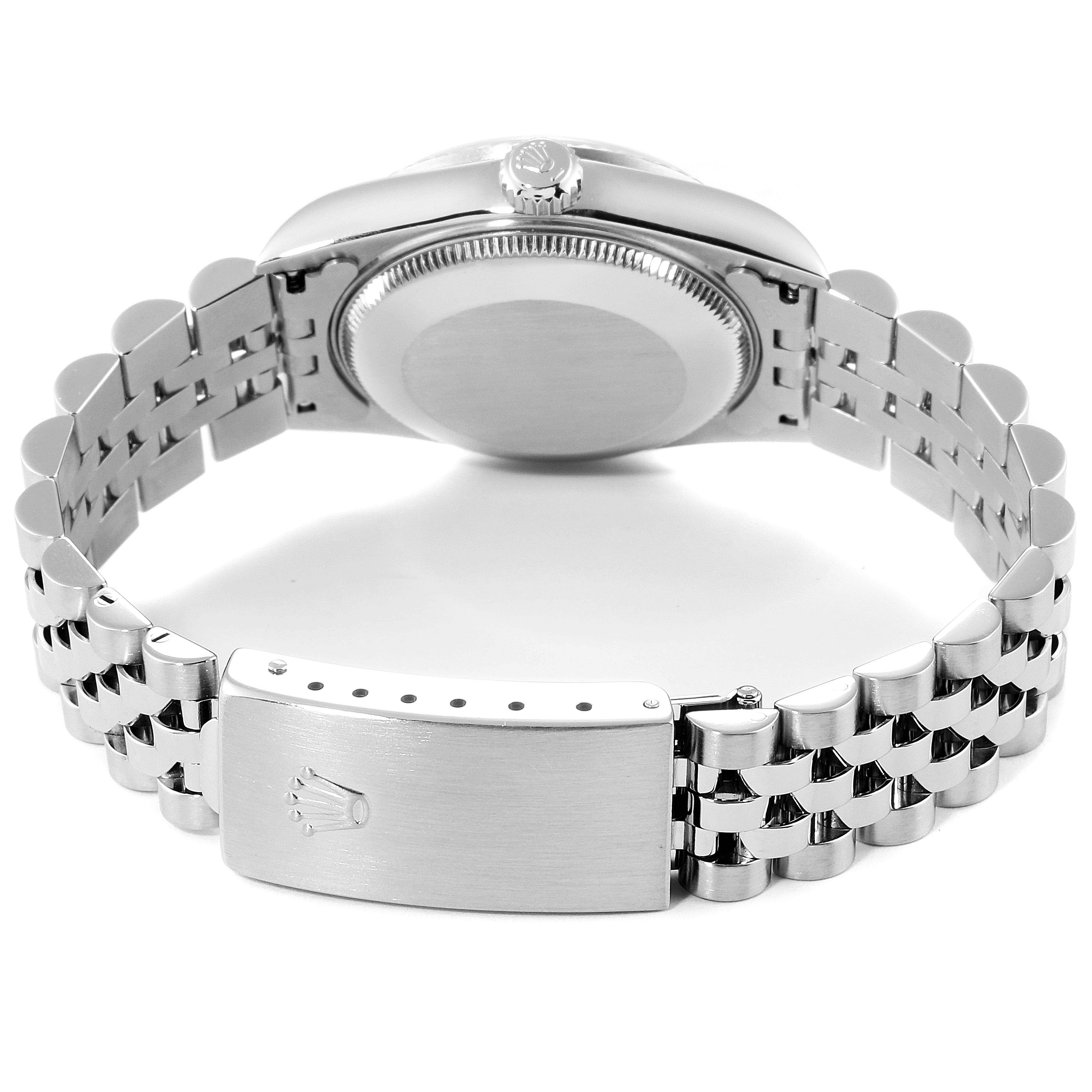 This image shows the back view of a Rolex Mid-Size 78274 Women
s Stainless Steel Black Dial 78274 Women
s Stainless Steel Black Dial watch, including its case back and bracelet clasp.