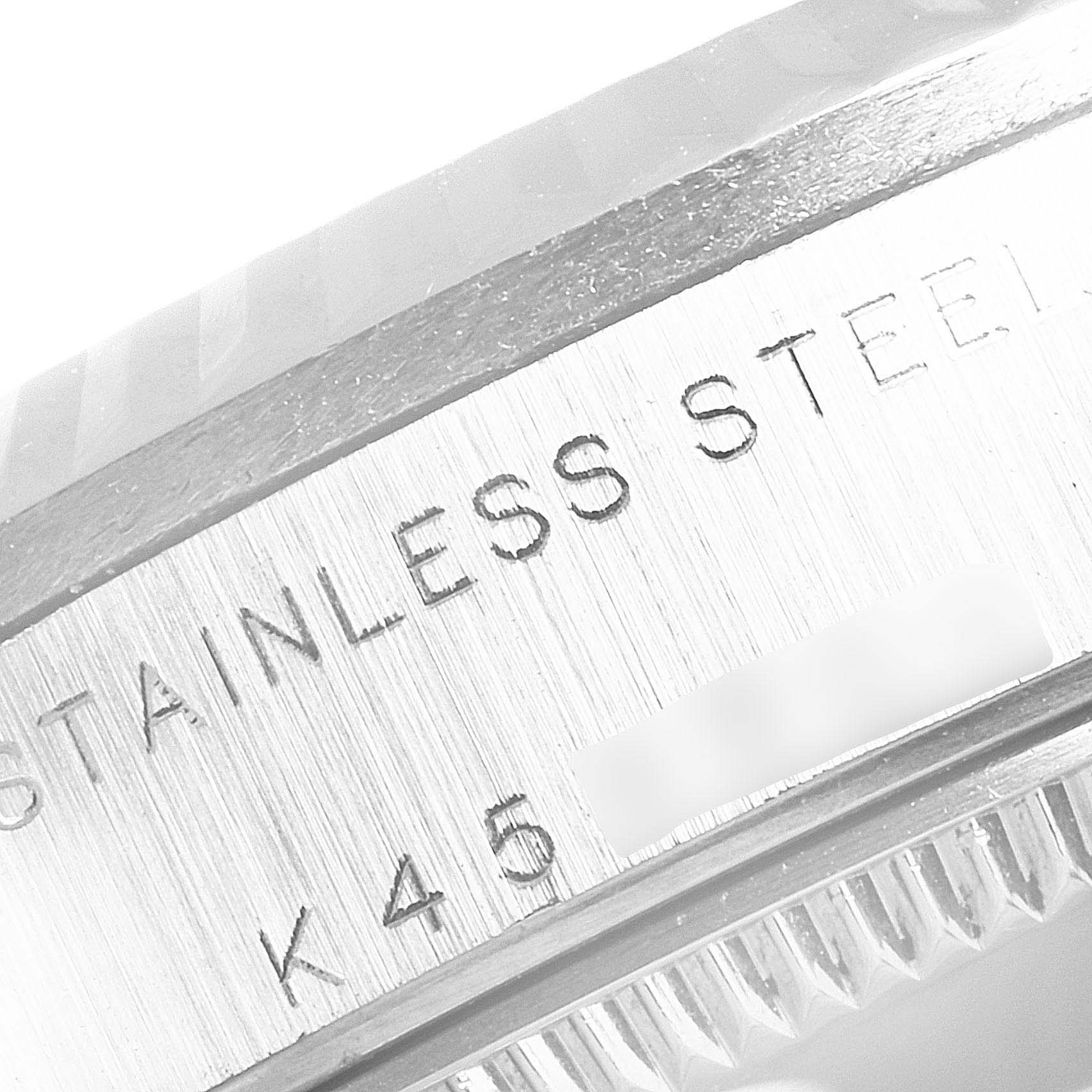 This close-up image shows the engraving on the stainless steel case of a Rolex Mid-Size 78274 Women
s Stainless Steel Black Dial 78274 Women
s Stainless Steel Black Dial watch.