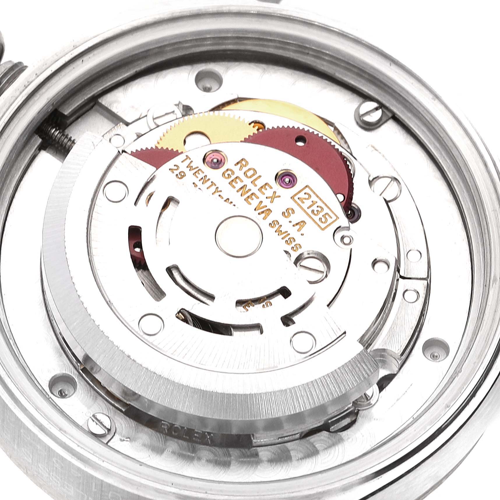 The image shows the internal mechanics and movement parts of a Rolex Mid-Size 68274 Women
s Stainless Steel Black Dial 68274 Women
s Stainless Steel Black Dial model watch from an overhead angle.