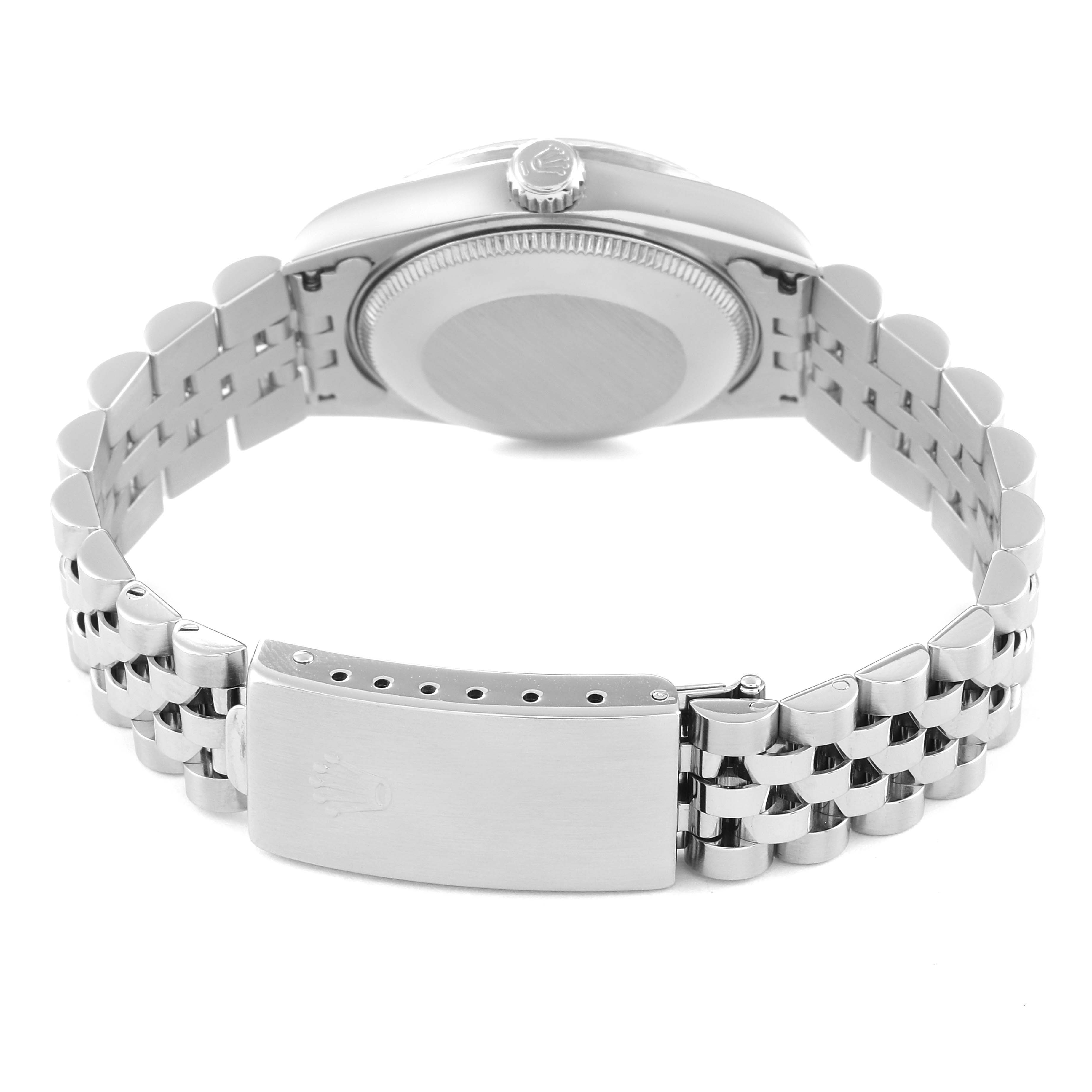 This image shows the back case and bracelet clasp of a Rolex Mid-Size 68274 Women
s Stainless Steel Black Dial 68274 Women
s Stainless Steel Black Dial watch from a horizontal angle.