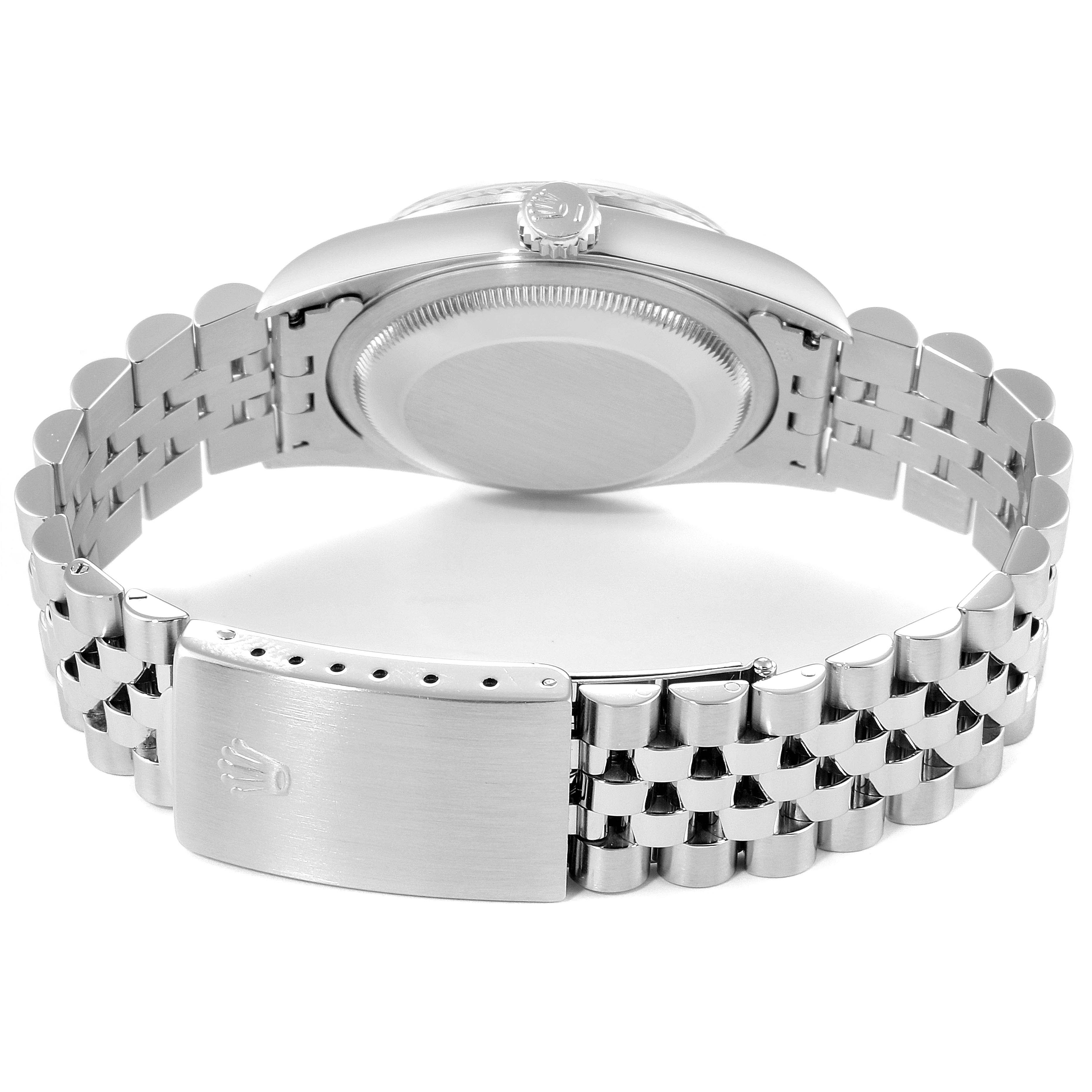 This image shows the back view of a Rolex Datejust 16234 Men's Stainless Steel Silver Dial 16234 Men's Stainless Steel Silver Dial watch, focusing on the case back and stainless steel bracelet with a deployment clasp.