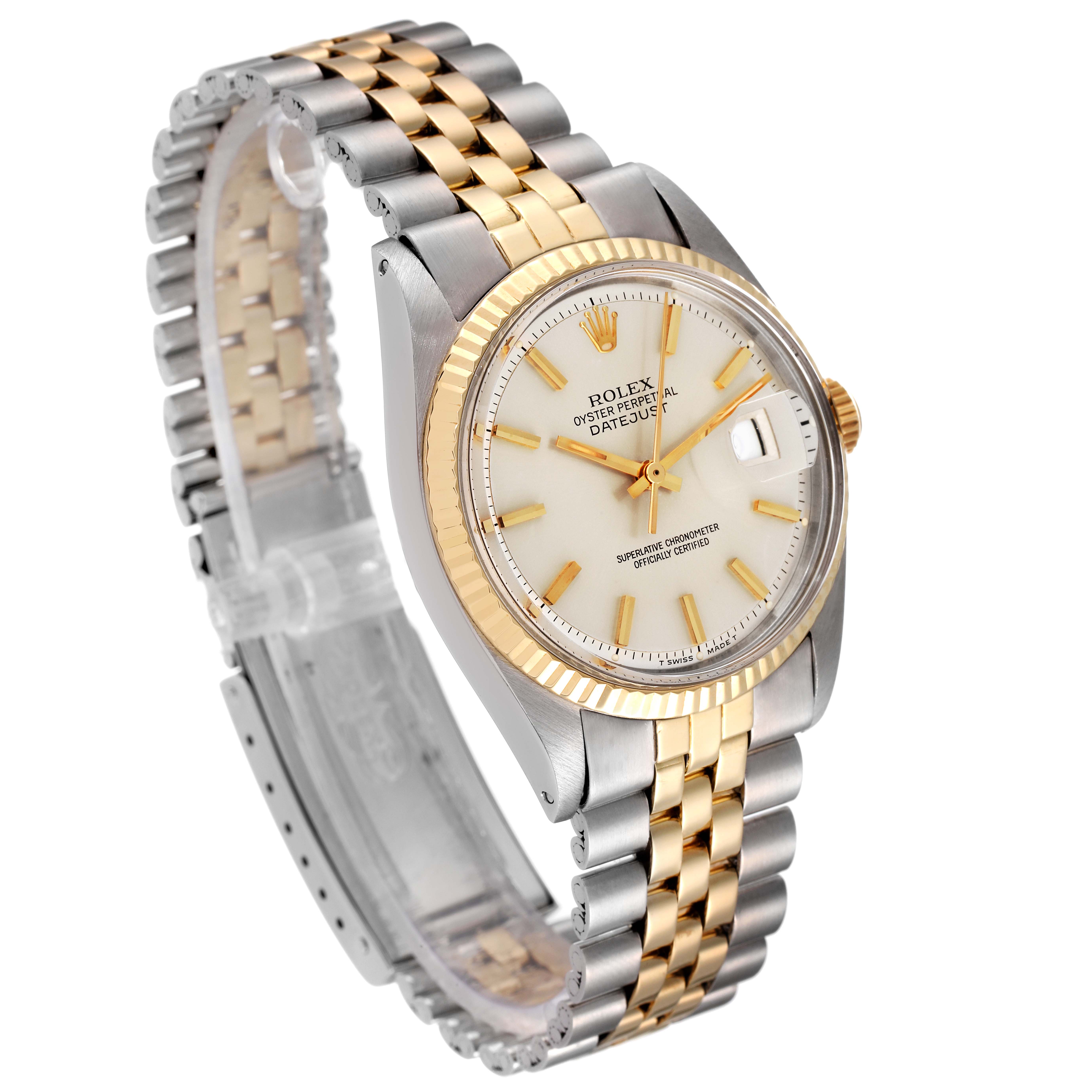 The watch is a Rolex Vintage Collection 1601 Men
s Steel and Gold (two tone) Silver Dial 1601 Men
s Steel and Gold (two tone) Silver Dial model shown from a three-quarter angle, displaying its dial, case, and bracelet.