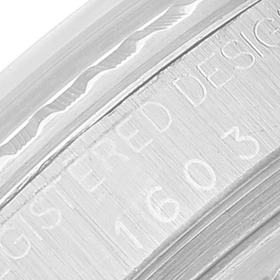 The image shows a close-up view of the case back and engraving on a Rolex Datejust 1603 Men
s Stainless Steel Silver Dial 1603 Men
s Stainless Steel Silver Dial model.