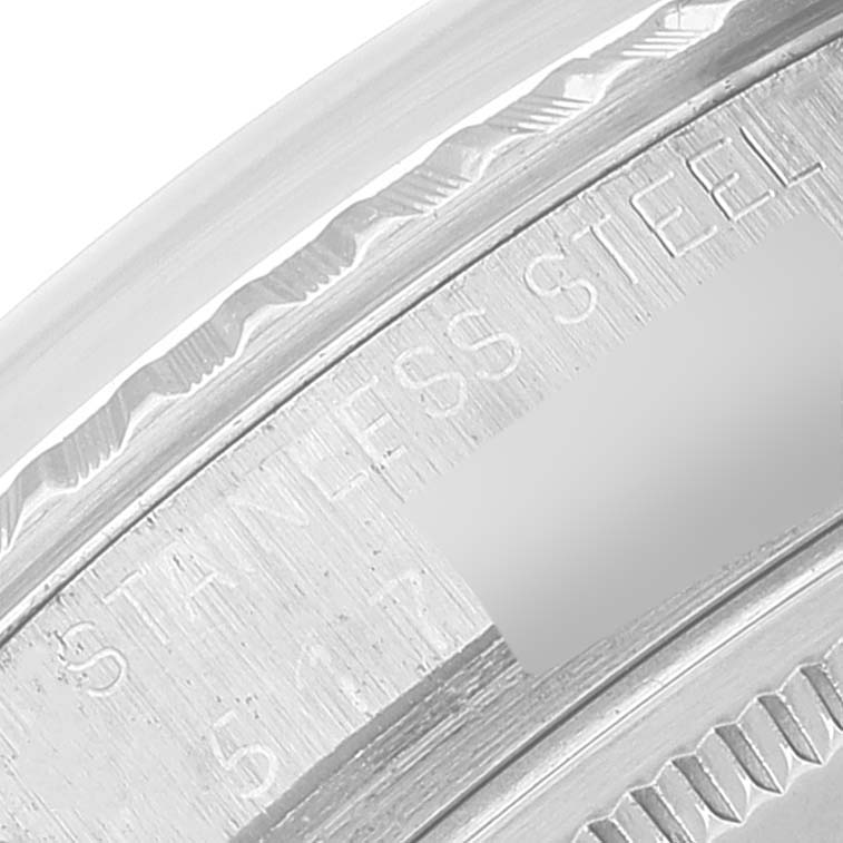 This image shows a close-up of the engraved details on the stainless steel case back of a Rolex Datejust 1603 Men
s Stainless Steel Silver Dial 1603 Men
s Stainless Steel Silver Dial watch.