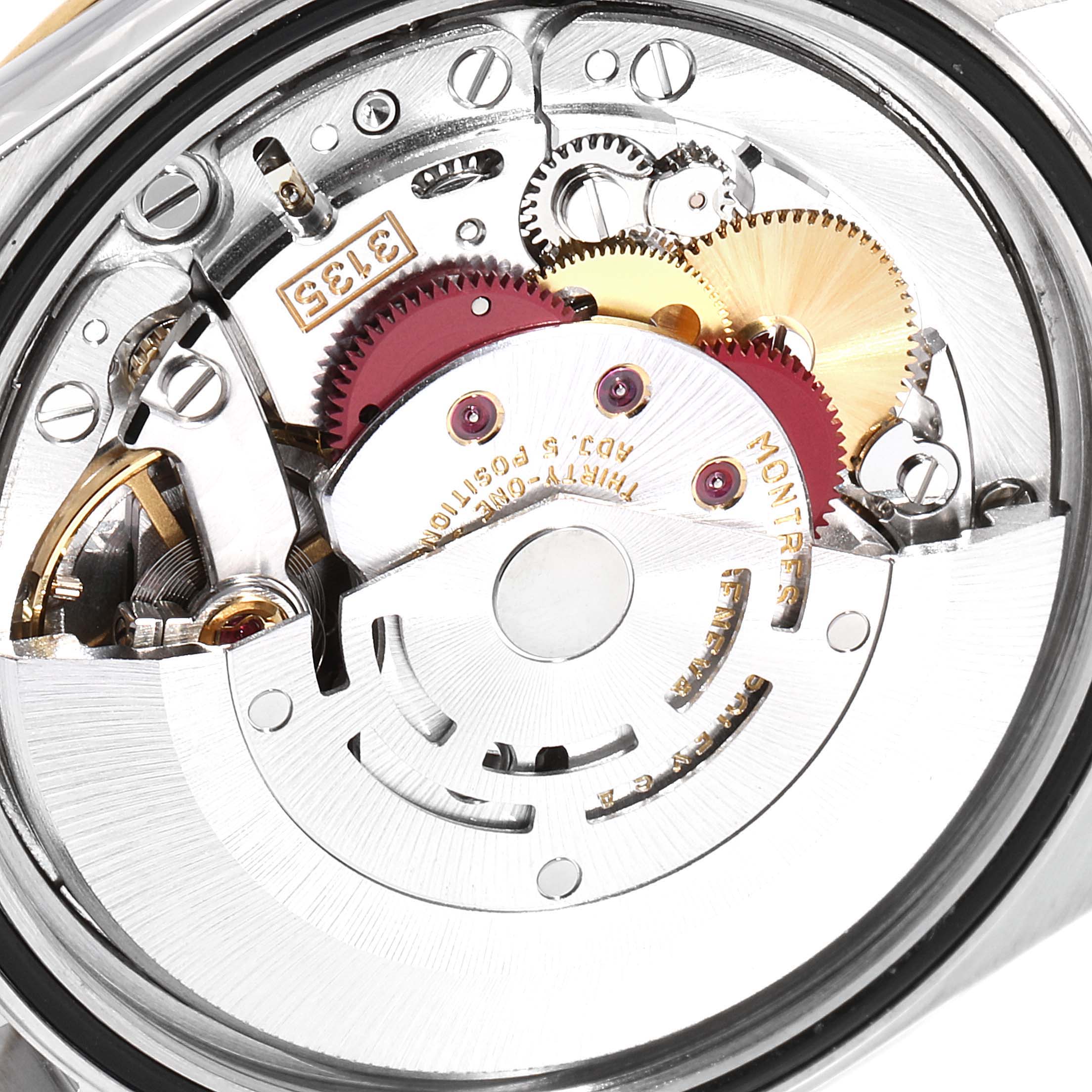 This image shows the internal mechanism of a Rolex Datejust 16233 Men
s Steel and Gold (two tone) Champagne Dial 16233 Men
s Steel and Gold (two tone) Champagne Dial watch, revealing gears and movement components.