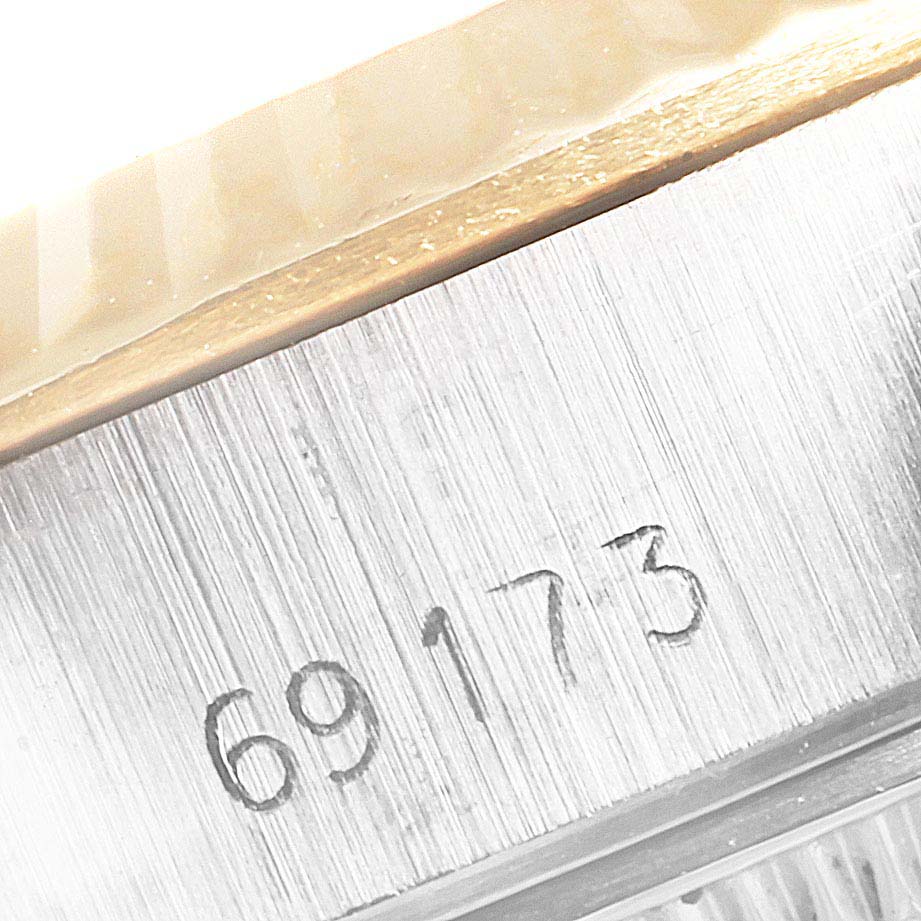 The image shows a close-up of the serial number "69173" engraved on the case side of a Rolex Datejust 69173 Women's Steel and Gold (two tone) Champagne Dial 69173 Women's Steel and Gold (two tone) Champagne Dial watch.