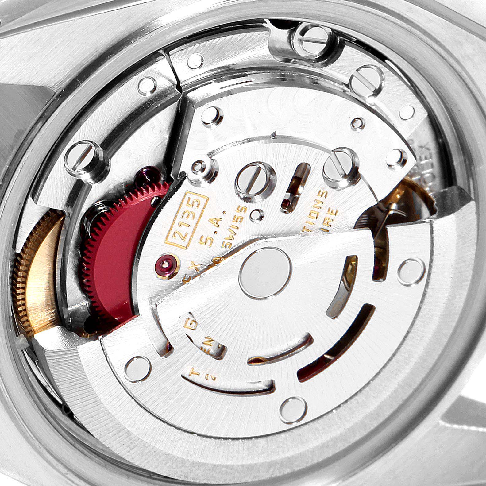 The image shows a close-up view of the internal mechanism of a Rolex Datejust 69173 Women's Steel and Gold (two tone) Champagne Dial 69173 Women's Steel and Gold (two tone) Champagne Dial watch, highlighting the intricate movement parts.