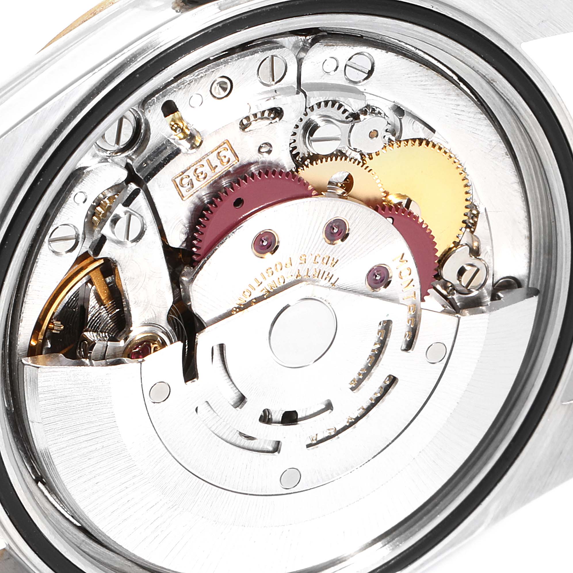 The angle shows the inner mechanics and movement of a Rolex Datejust 16233 Men
s Steel and Gold (two tone) Champagne Dial 16233 Men
s Steel and Gold (two tone) Champagne Dial watch with visible gears and components.