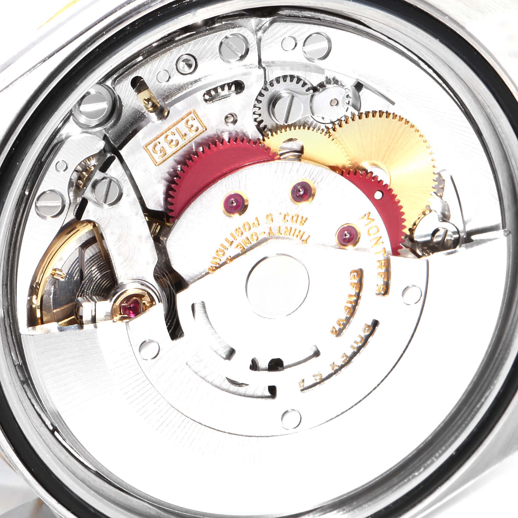 This image shows an internal view of the Rolex Datejust 16233 Men's Steel and Gold (two tone) Champagne Dial 16233 Men's Steel and Gold (two tone) Champagne Dial movement mechanism, highlighting gears and intricate components.