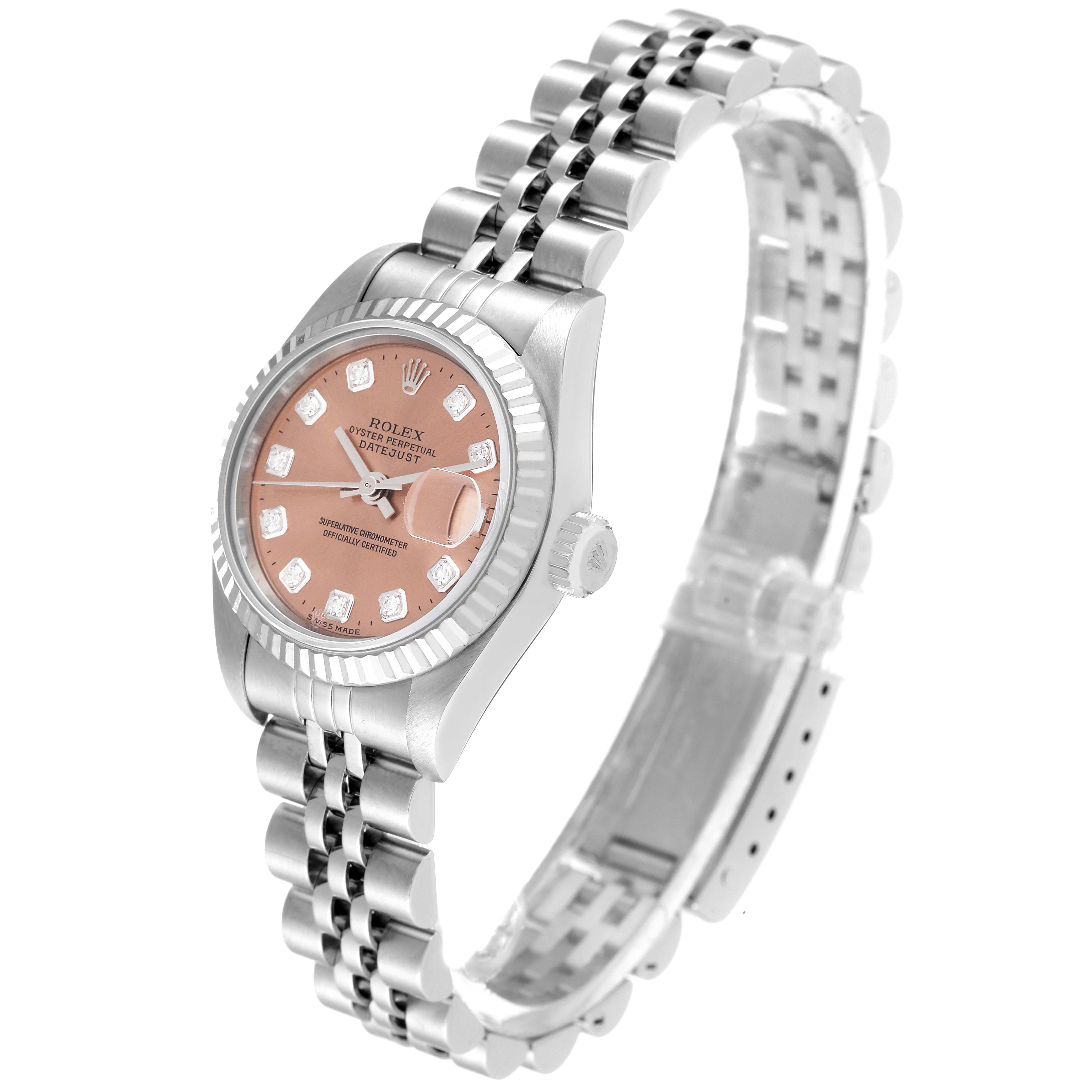 The Rolex Datejust 79174 Women
s Stainless Steel Pink Dial 79174 Women
s Stainless Steel Pink Dial watch is shown at an angled perspective highlighting the dial, crown, bezel, and the bracelet.