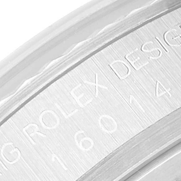 This close-up image shows the engraved inner rim of a Rolex Datejust 16014 Men
s Stainless Steel Silver Dial 16014 Men
s Stainless Steel Silver Dial watch.