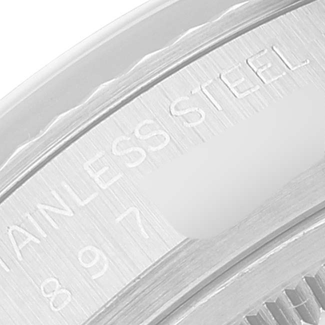 This close-up image shows the "STAINLESS STEEL" engraving on the side of a Rolex Datejust 16014 Men
s Stainless Steel Silver Dial 16014 Men
s Stainless Steel Silver Dial watch case.