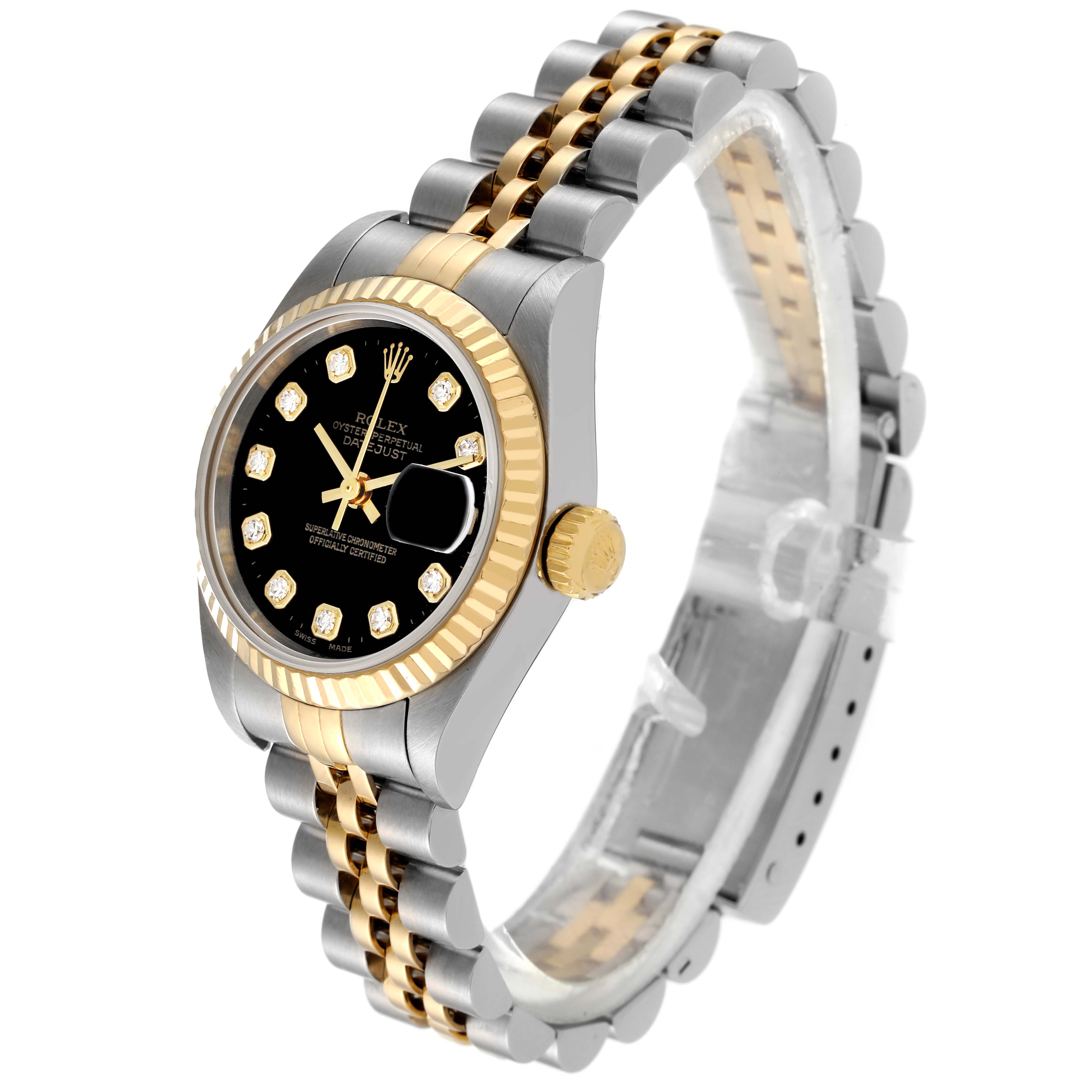 The image shows a Rolex Datejust 79173 Women's Steel and Gold (two tone) Black Dial 79173 Women's Steel and Gold (two tone) Black Dial watch at a three-quarter angle, highlighting its black dial, diamond hour markers, fluted bezel, and jubilee bracelet.