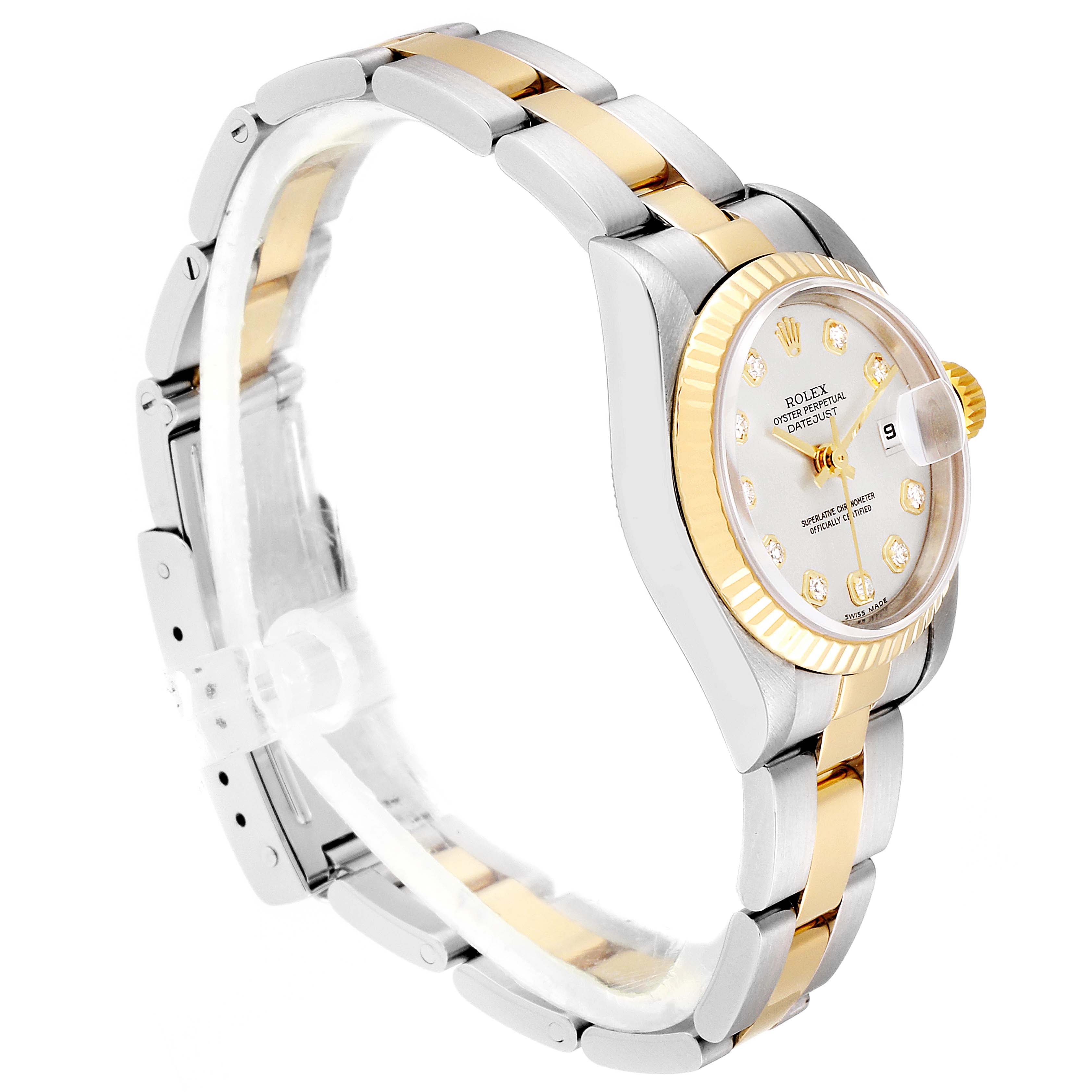 This Rolex Datejust 79173 Women's Steel and Gold (two tone) Silver Dial 79173 Women's Steel and Gold (two tone) Silver Dial watch is shown at an angle displaying the side view, bracelet, bezel, and partial dial with date feature.