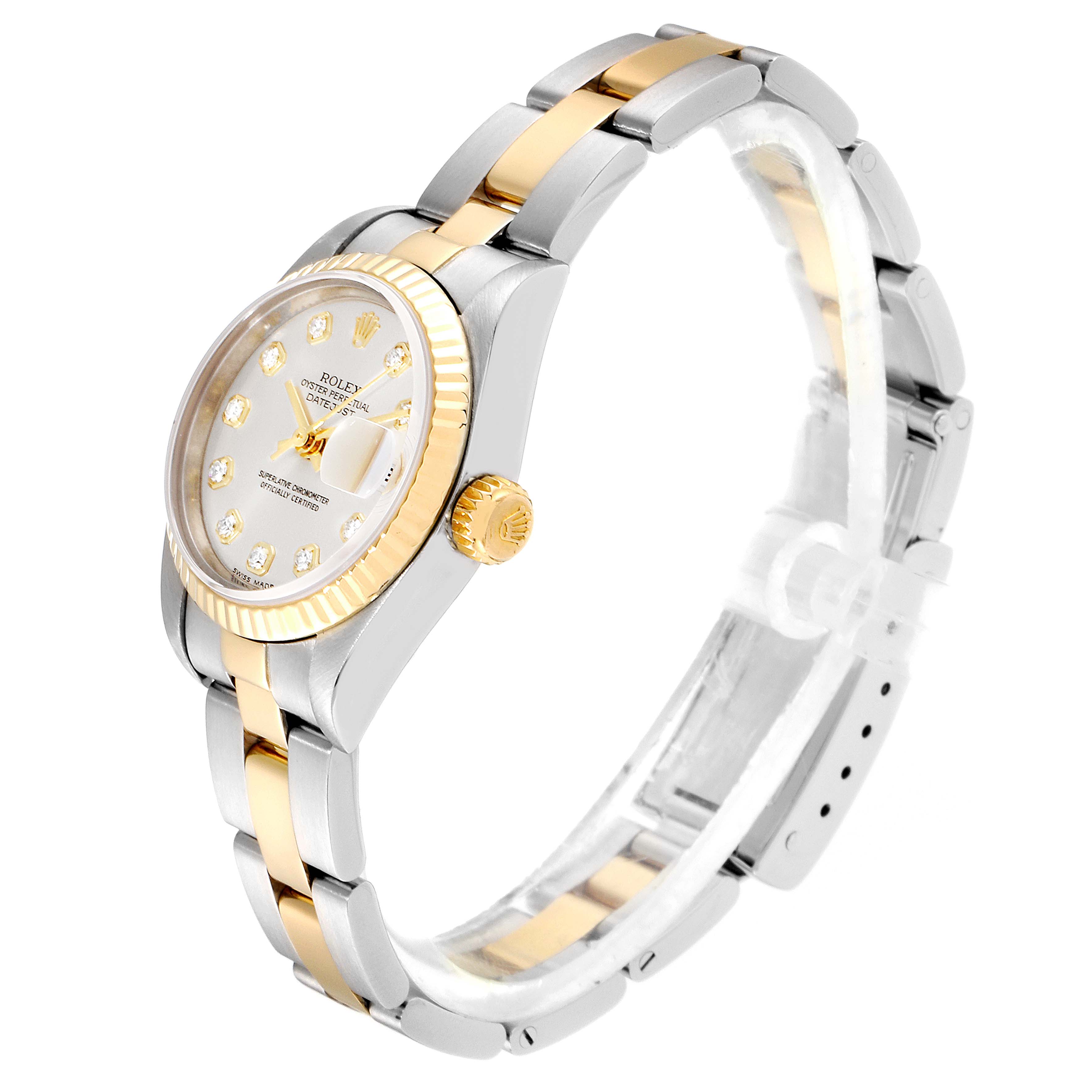 This Rolex Datejust 79173 Women's Steel and Gold (two tone) Silver Dial 79173 Women's Steel and Gold (two tone) Silver Dial watch is shown from a side angle, highlighting the white dial, gold fluted bezel, and two-tone bracelet.