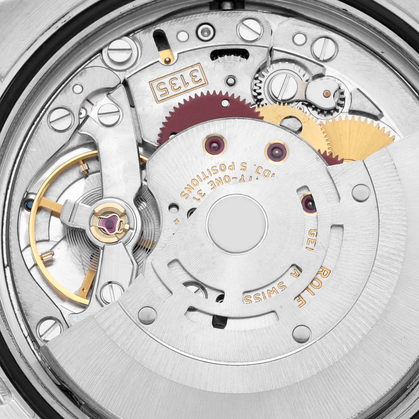 This image shows a close-up view of the movement mechanism of a Rolex Datejust 116233 Men's Steel and Gold (two tone) White Dial 116233 Men's Steel and Gold (two tone) White Dial watch, highlighting gears and components.