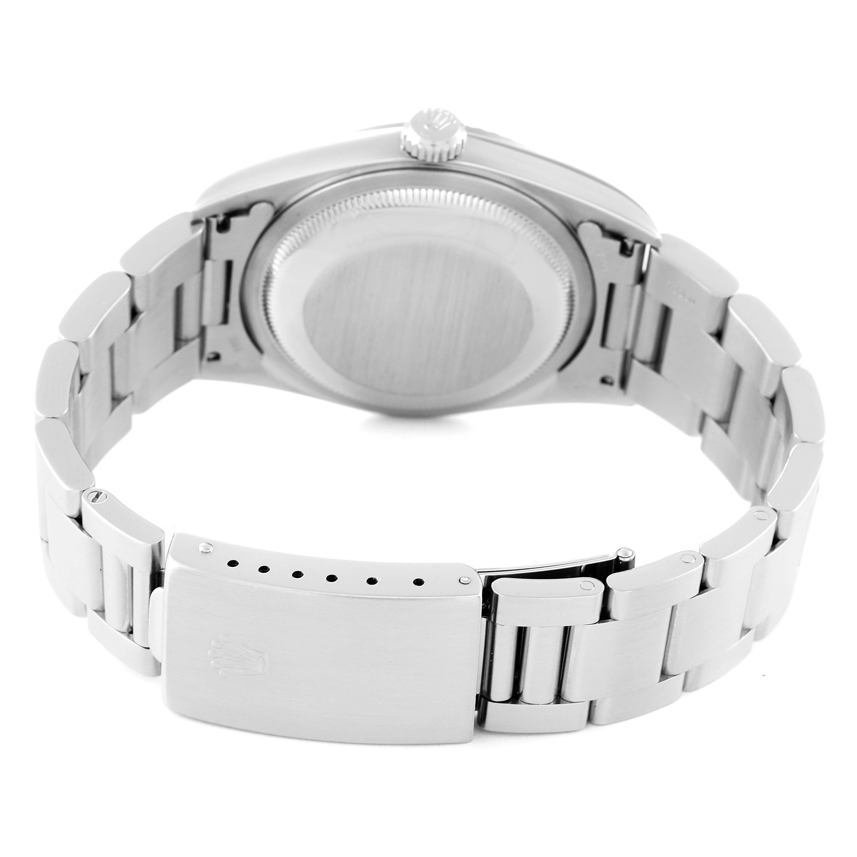 This image shows the back case and metal bracelet of a Rolex Datejust 16234 Men's Stainless Steel White Dial 16234 Men's Stainless Steel White Dial watch, viewed from the rear.