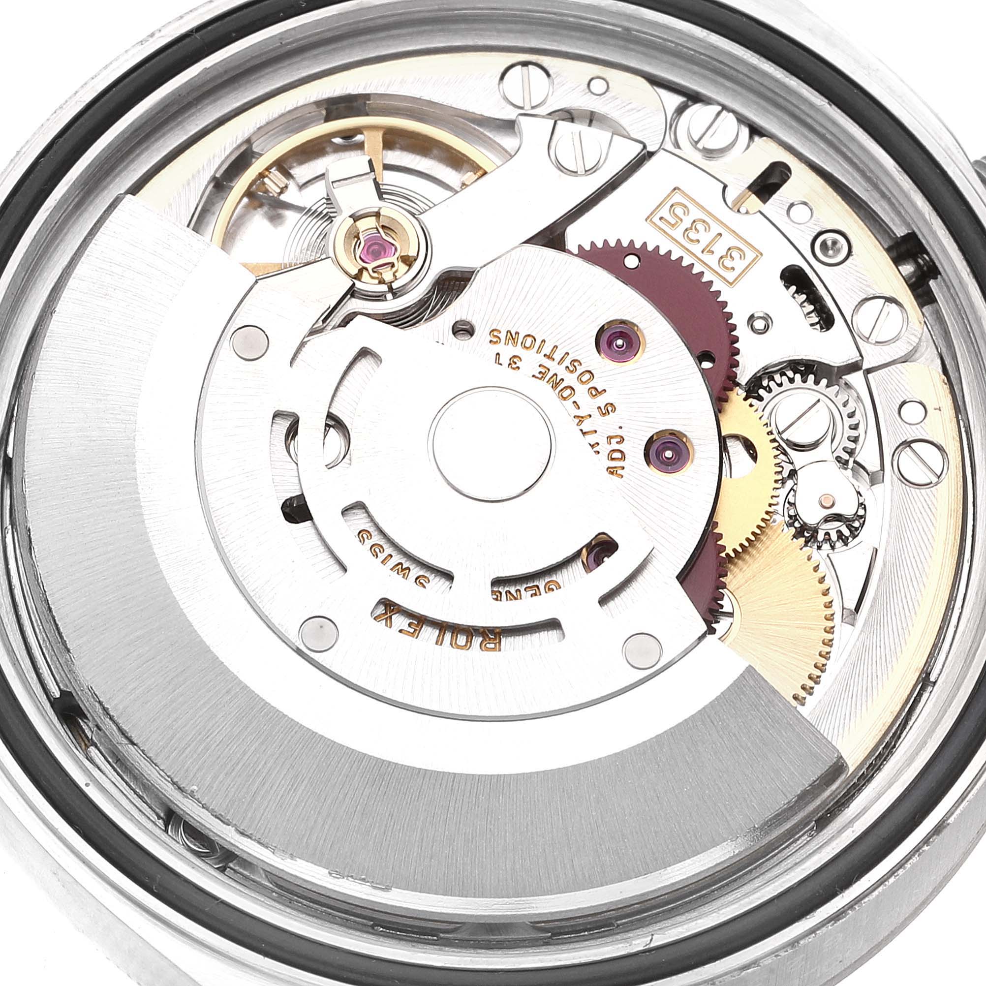 This image shows the movement mechanism with intricate gears of a Rolex Datejust 16234 Men's Stainless Steel White Dial 16234 Men's Stainless Steel White Dial watch from a top-down angle.