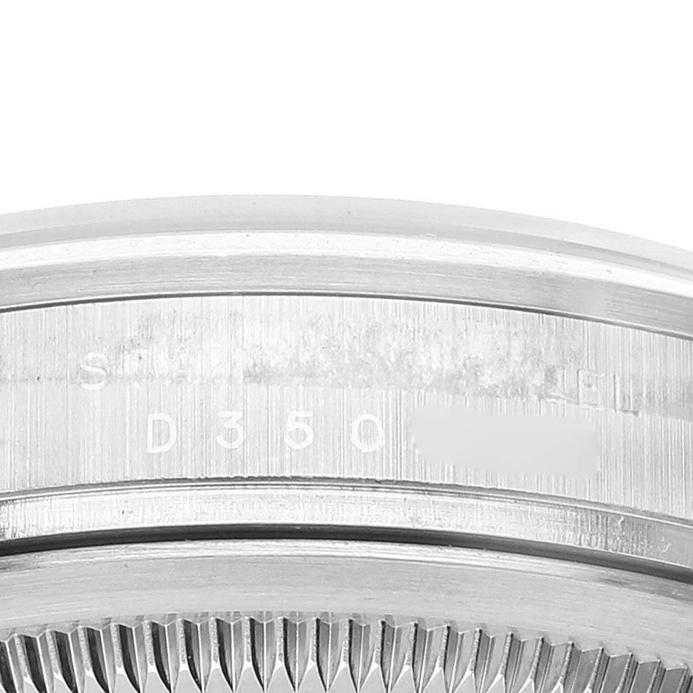 This image shows a close-up of the model number engraving on the side of a Rolex Explorer 114270 Men's Stainless Steel Black Dial 114270 Men's Stainless Steel Black Dial watch case.