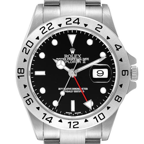 The image shows a front view of a Rolex Explorer II watch, highlighting the dial, bezel, date window, and part of the bracelet.