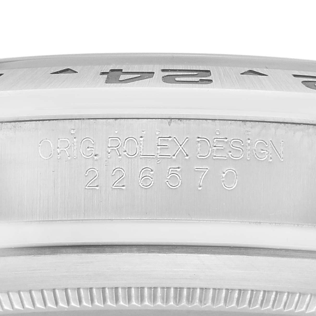 This image shows a close-up view of the side of a Rolex Explorer 226570 Men
s Stainless Steel White Dial 226570 Men
s Stainless Steel White Dial watch, focusing on the engraving of the model number and branding.