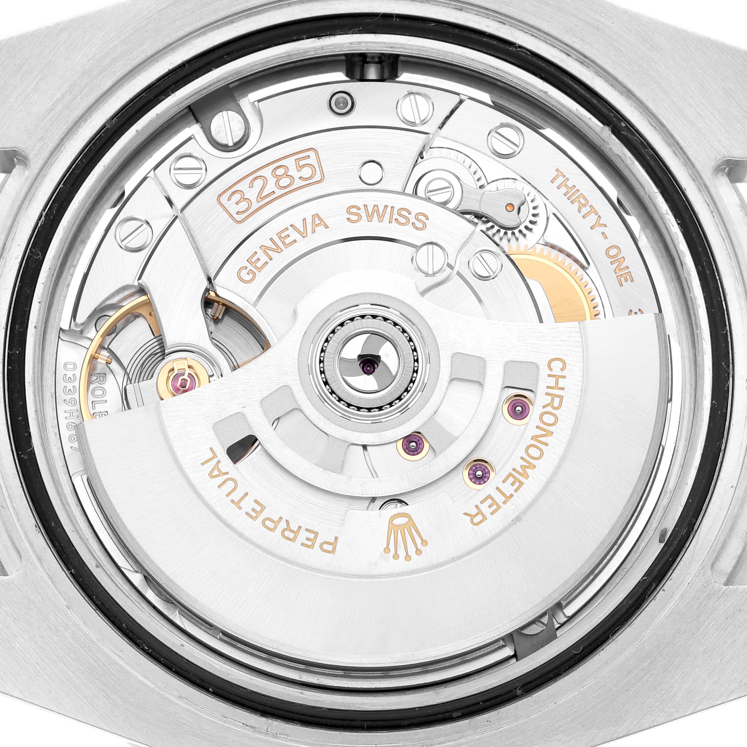 The image shows the back view of a Rolex GMT-Master 126710 Men
s Stainless Steel Black Dial, highlighting its movement and inner mechanical components.