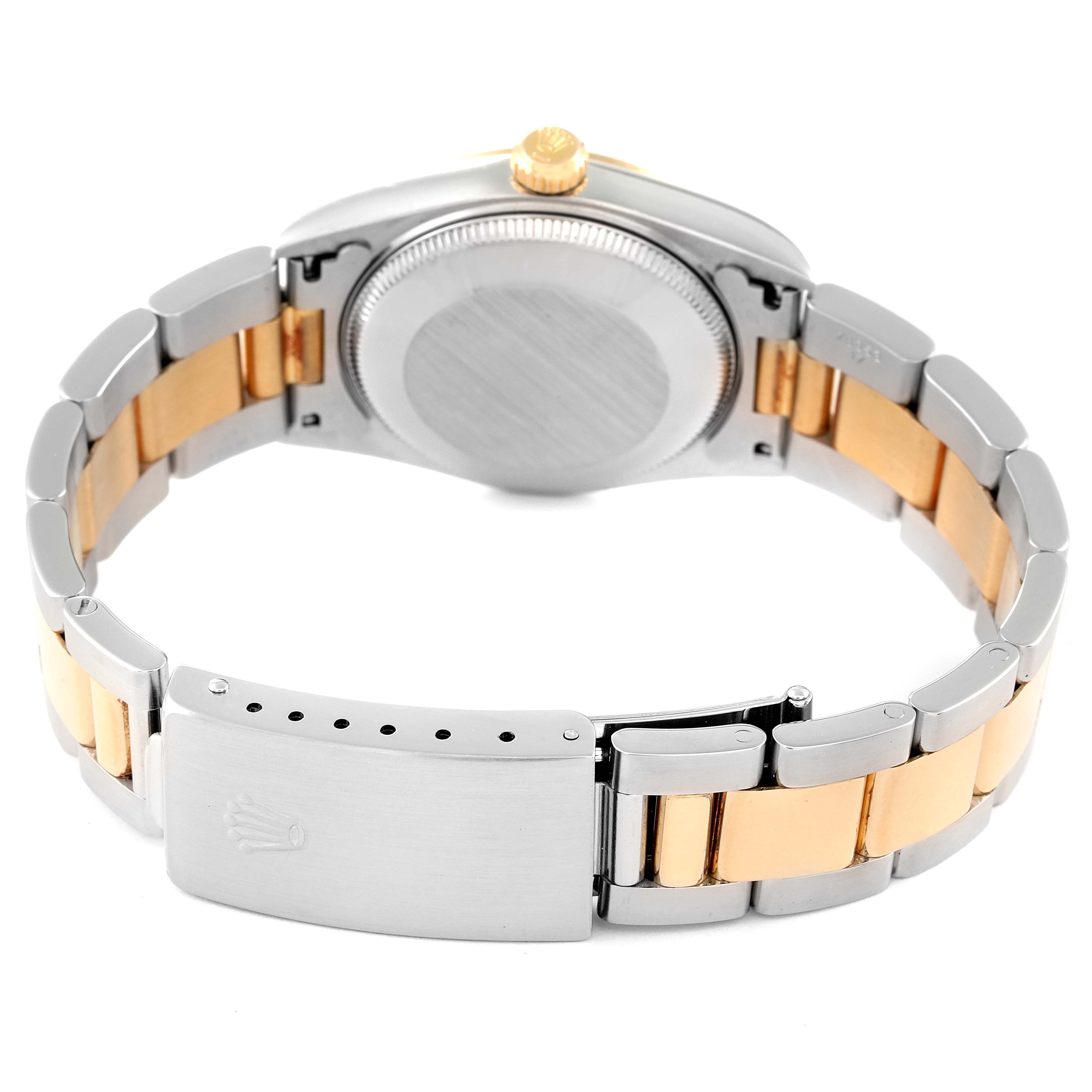 The image shows the back and clasp of a Rolex Mid-Size 77483 Women's Steel and Gold (two tone) Grey Dial 77483 Women's Steel and Gold (two tone) Grey Dial watch, highlighting its two-tone bracelet and case back.