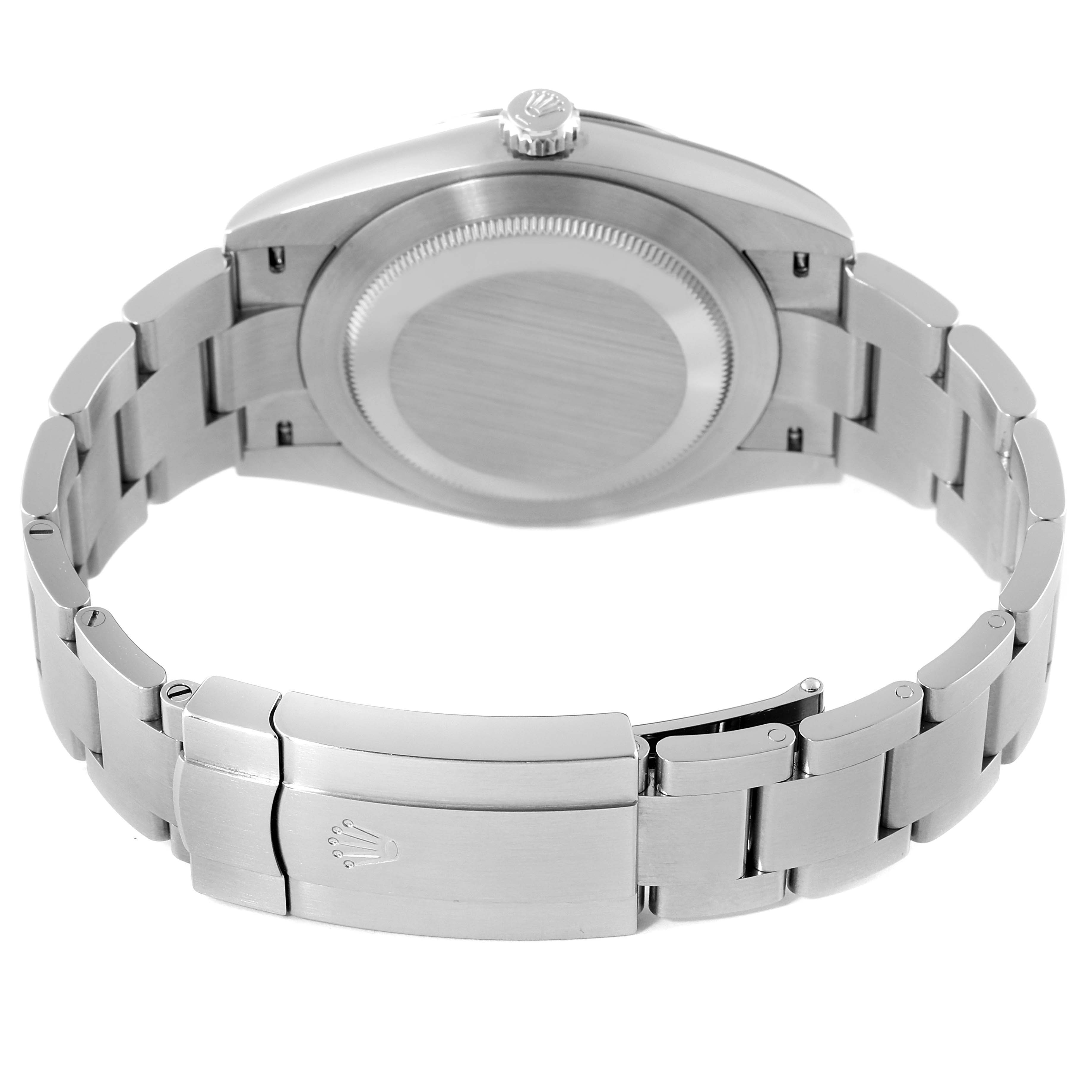 The image shows the back of a Rolex Oyster Perpetual 124300 Men's Stainless Steel Black Dial 124300 Men's Stainless Steel Black Dial watch, focusing on the case back, bracelet, and clasp.