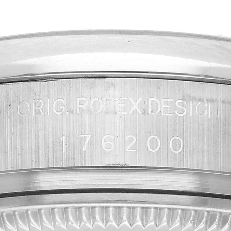 This image shows the side of the case of a Rolex Oyster Perpetual 176200 Women's Stainless Steel Black Dial 176200 Women's Stainless Steel Black Dial watch, featuring the engraved model number "176200".