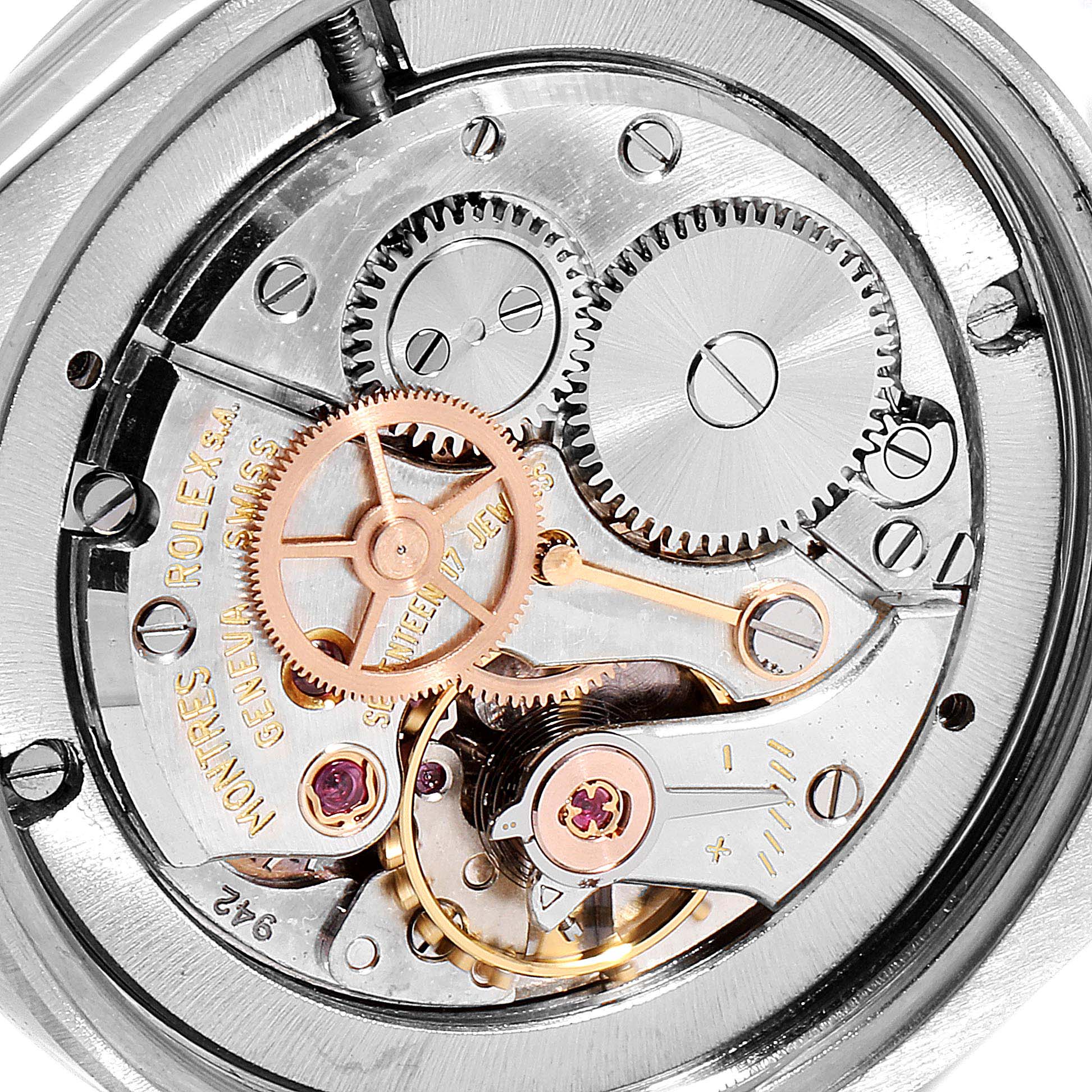 The image shows the internal mechanism of the Rolex Vintage Collection 6694 Men's Stainless Steel Black Dial 6694 Men's Stainless Steel Black Dial model watch, specifically the gears and movement components.